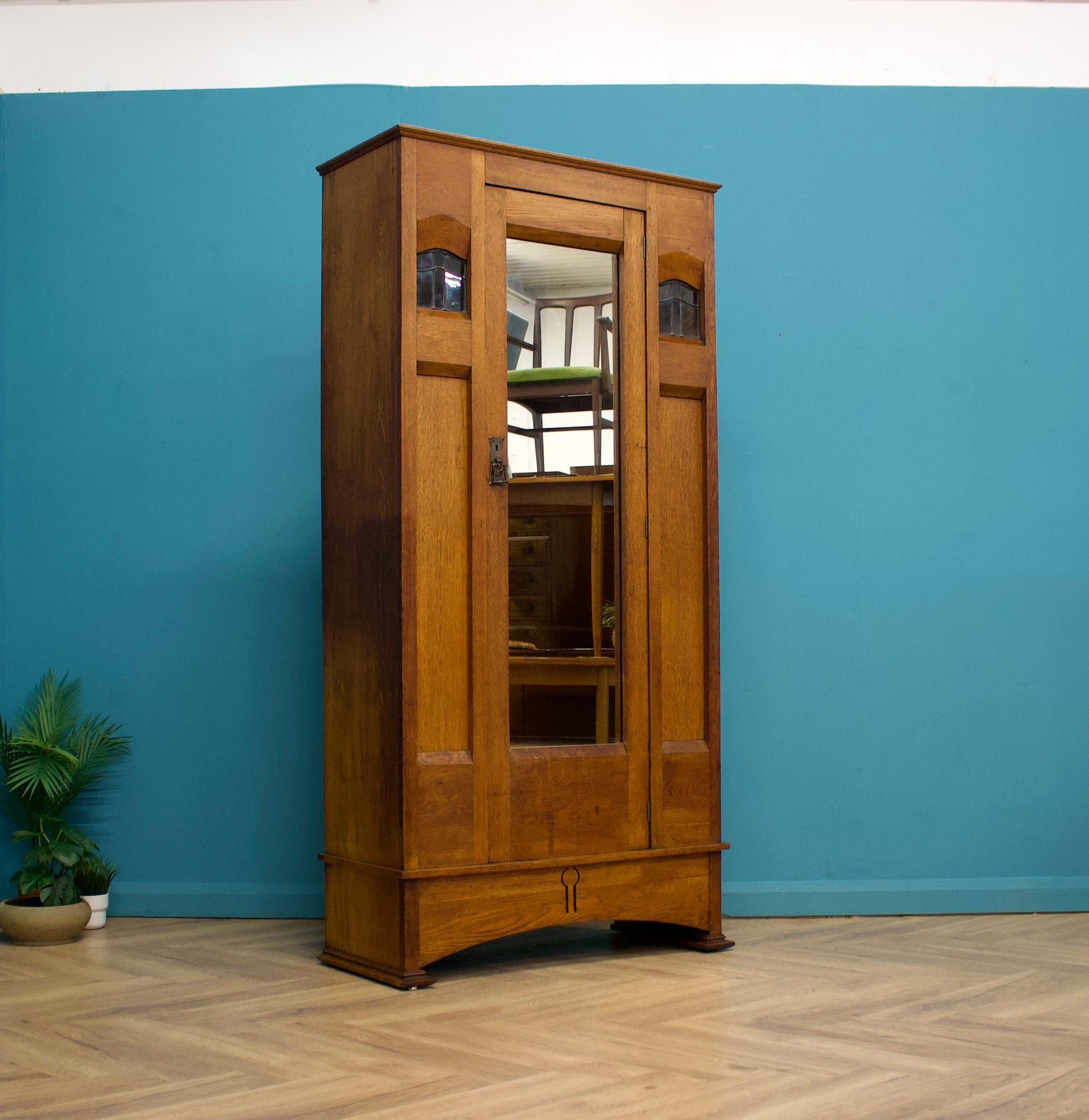 An impressive quality oak Arts & Crafts hall robe/cupboard  - circa 1900's


The piece shares many distinctive features of works by Shapland and Petters and Liberty & Co


Inside the cupboard has coat hooks - the middle coat hook rotates


There's