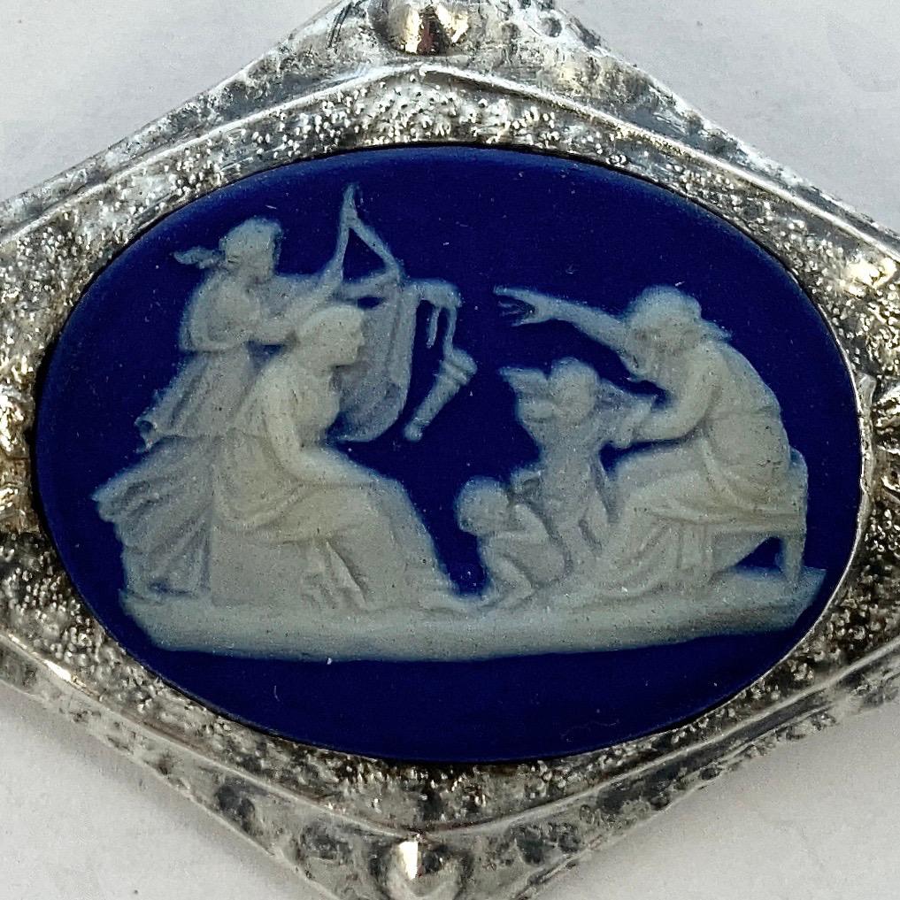 Wonderful Arts and Crafts silver front brooch, featuring an oval blue cameo. This lovely detailed brooch tests for silver to the front, but not the back. Measuring 7.4cm / 2.9 inches by 3.8cm / 1.5 inches. It has the old 
