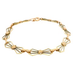 Antique Arts & Crafts 10k Green and Rose Gold Bow Geometric Open Work Bracelet
