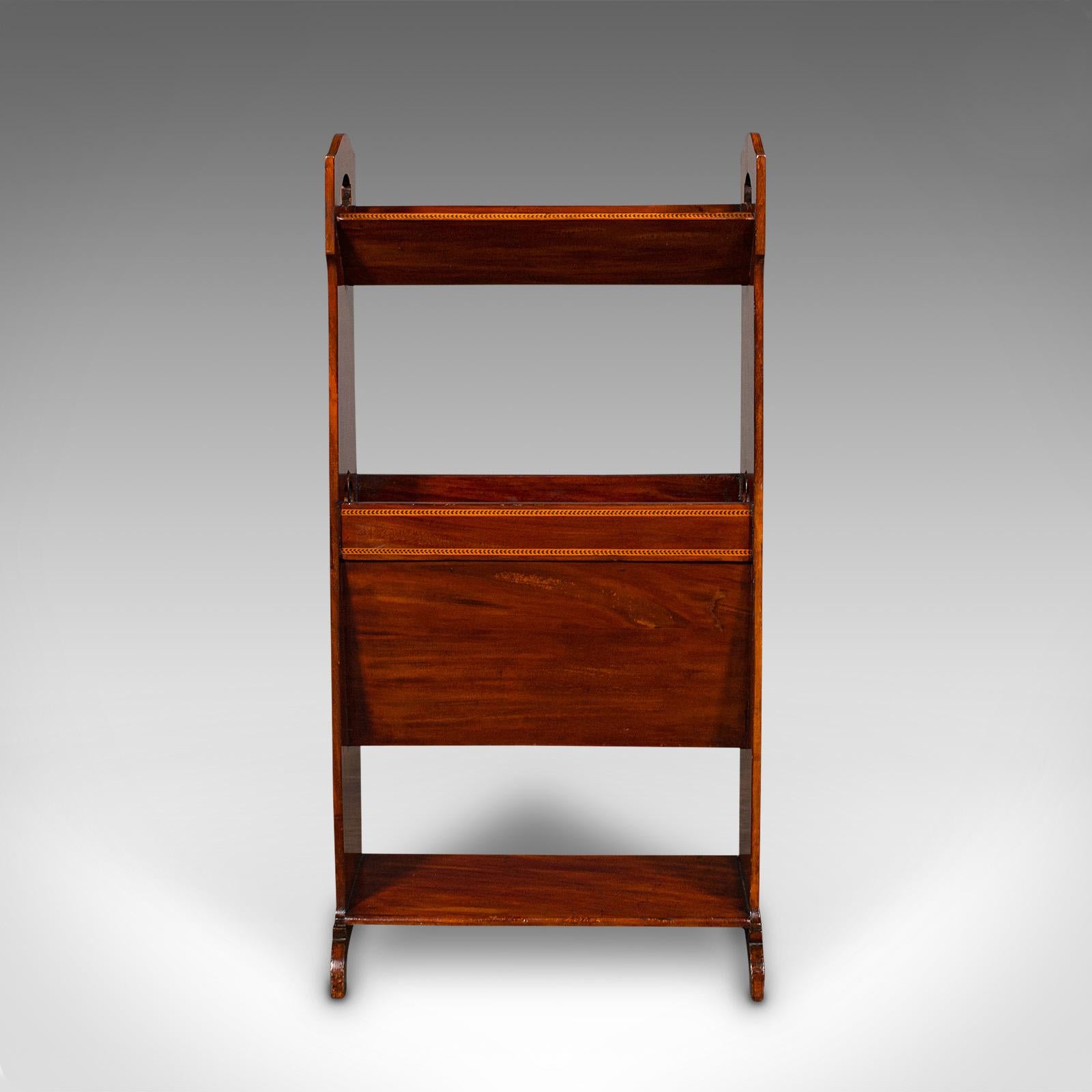 This is an antique Arts & Crafts book stand. An English, mahogany magazine rack or Canterbury, dating to the Edwardian period, circa 1910.

Of delightful form and attractive presentation for the avid reader
Displays a desirable aged patina and in