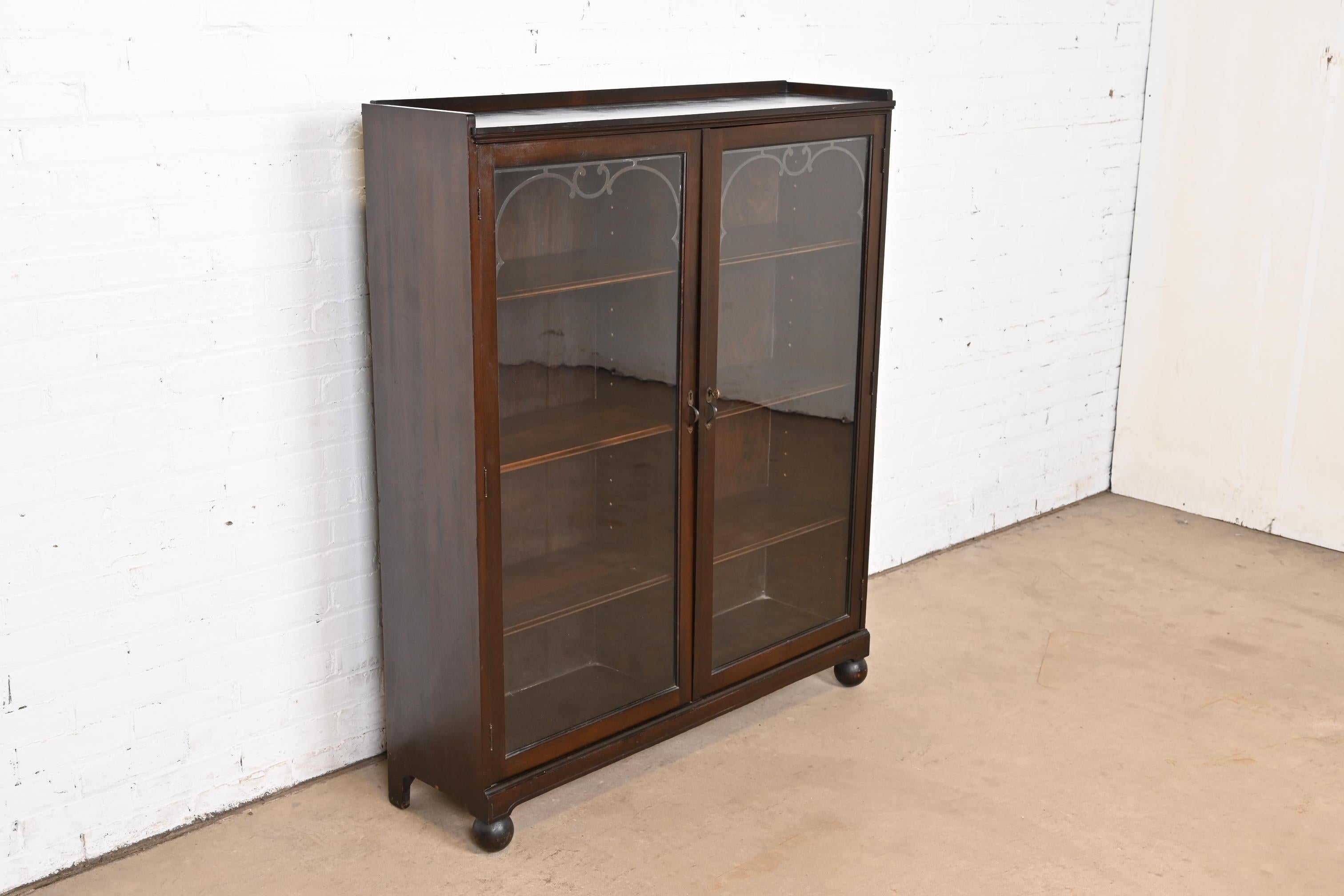 Antique Arts & Crafts Carved Mahogany Glass Front Double Bookcase, Circa 1900 In Good Condition In South Bend, IN