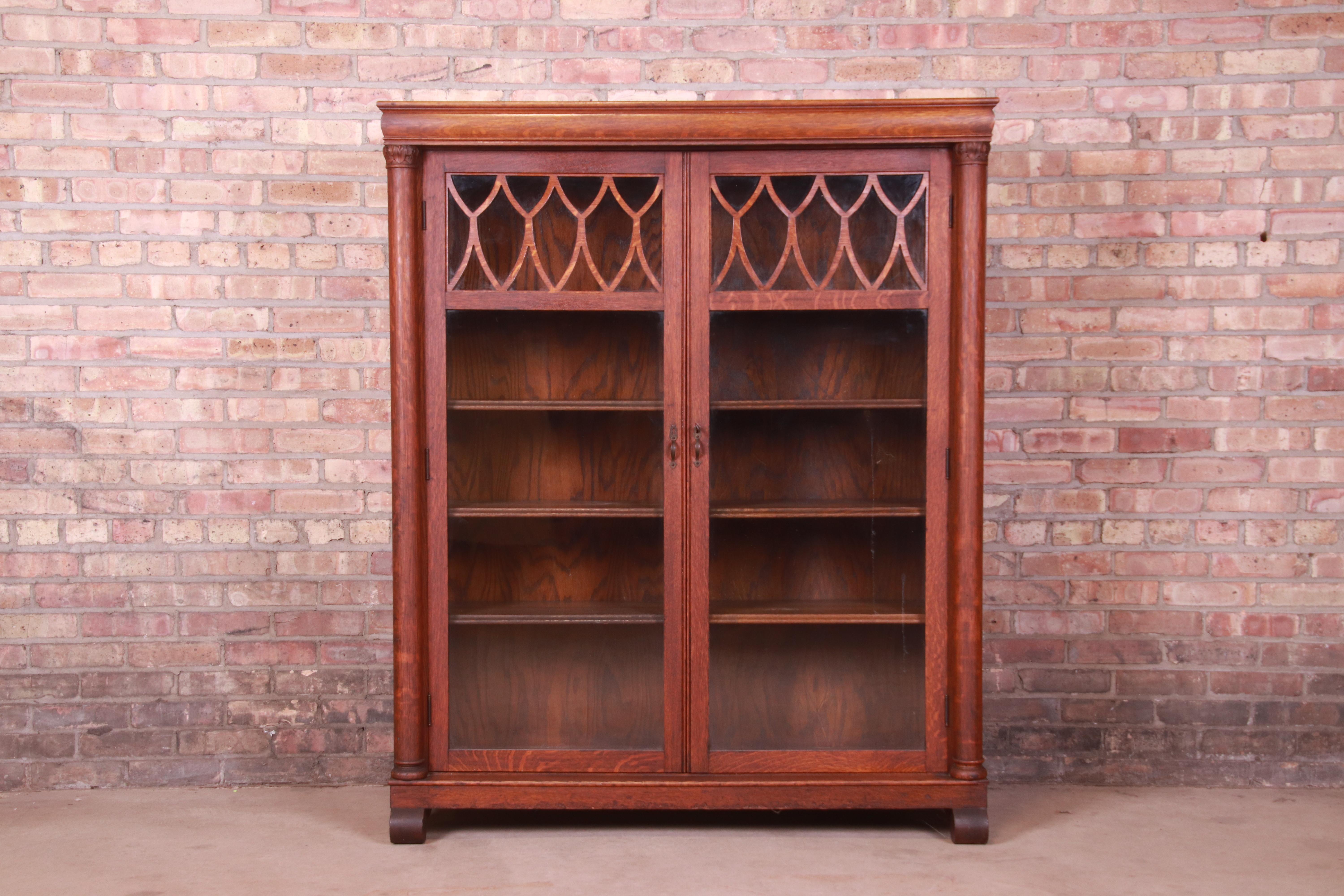 Arts and Crafts Antique Arts & Crafts Carved Oak Glass Front Double Bookcase, Circa 1900