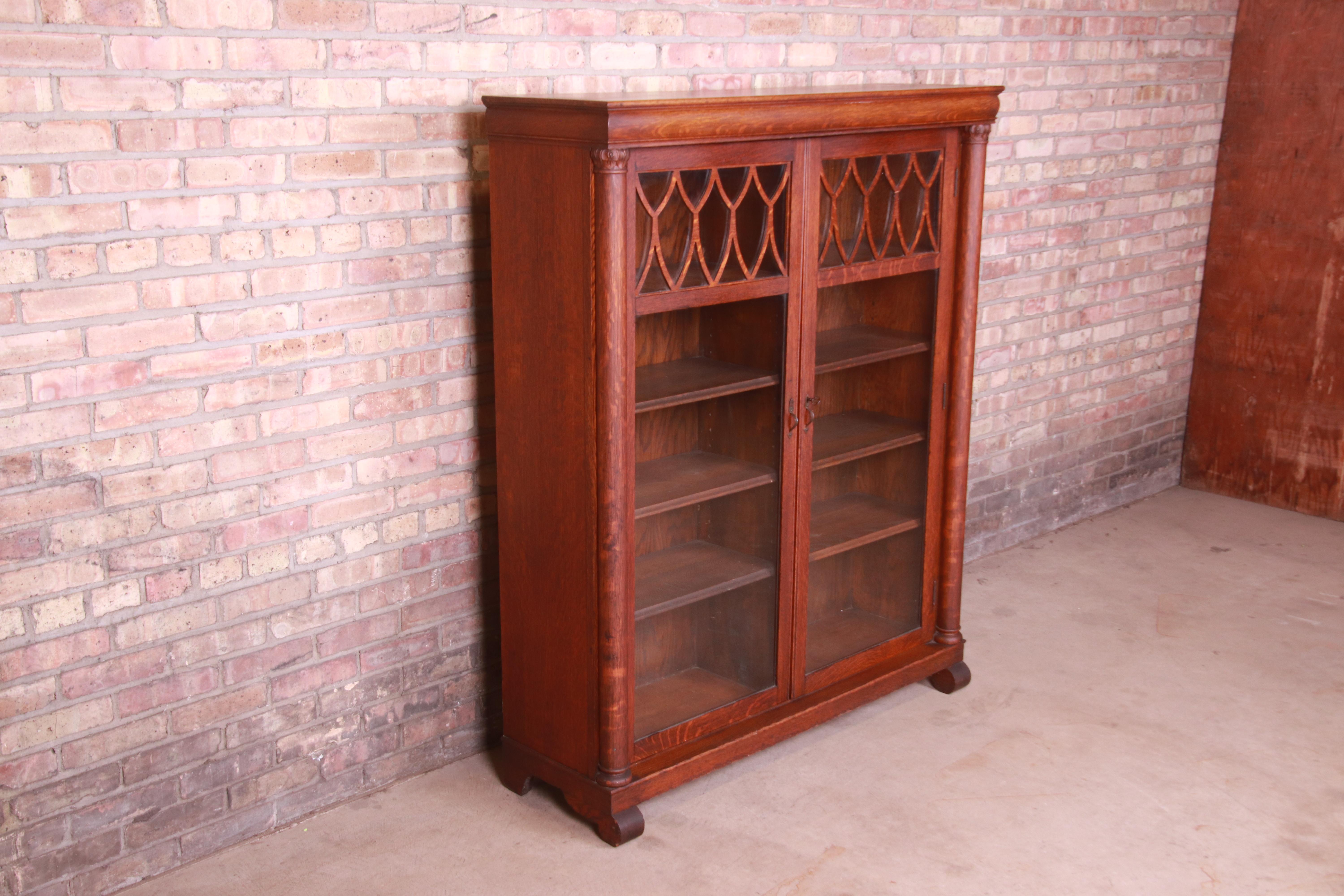 20th Century Antique Arts & Crafts Carved Oak Glass Front Double Bookcase, Circa 1900