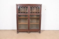 Antique Arts & Crafts Carved Oak Glass Front Double Bookcase, Circa 1900
