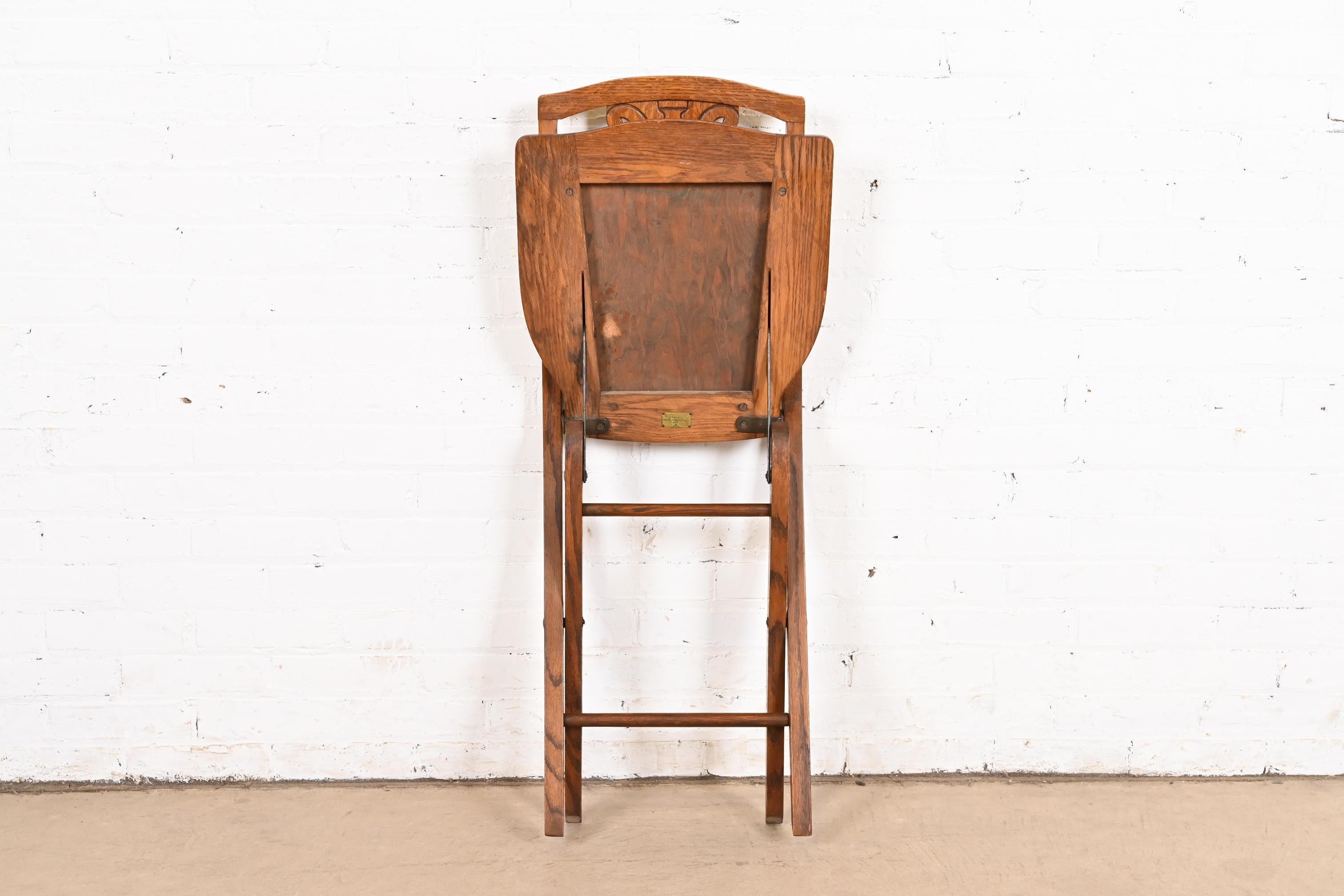 Antique Arts & Crafts Carved Oak Lyre Back Folding Chair by Phoenix Chair Co. For Sale 4