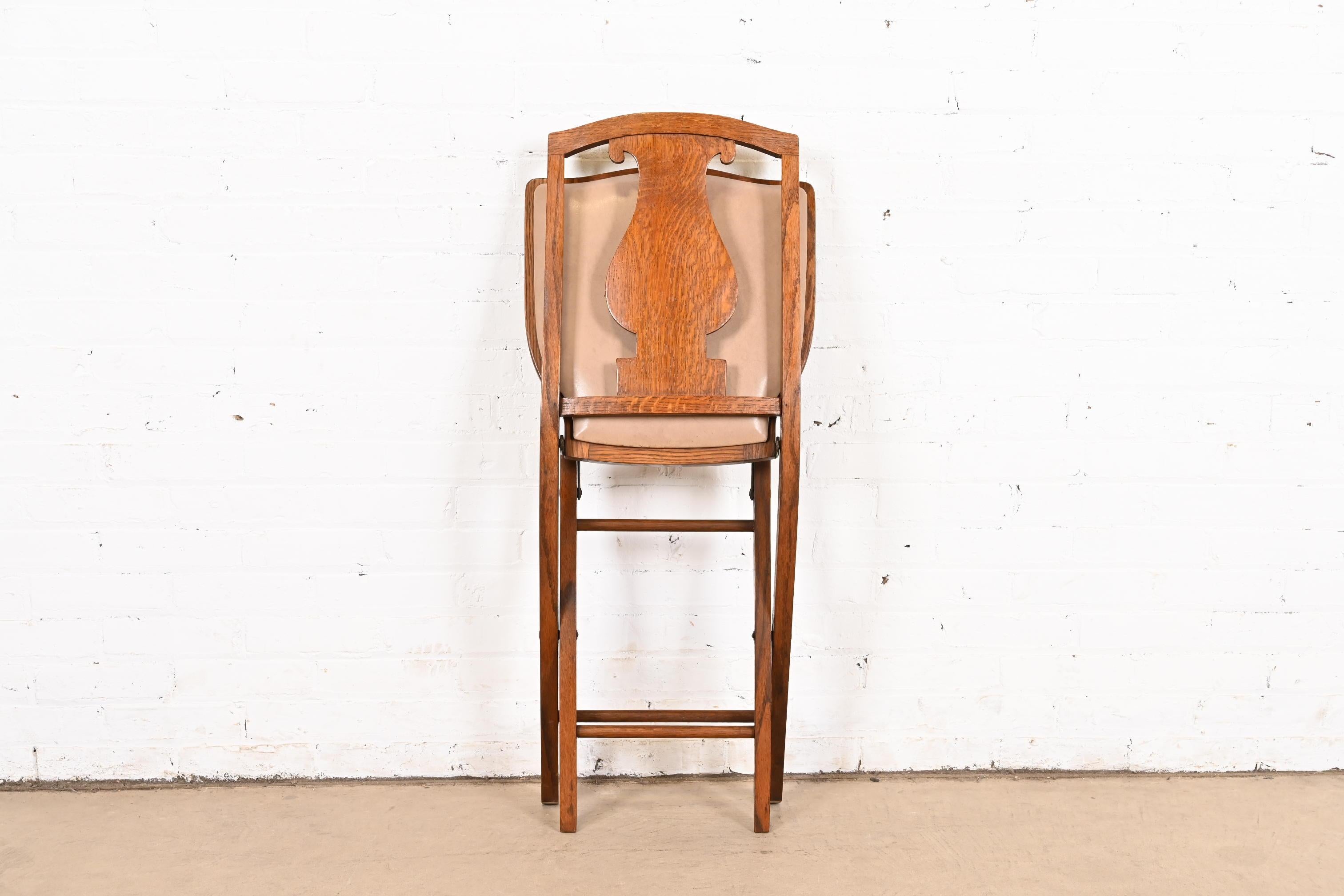 Antique Arts & Crafts Carved Oak Lyre Back Folding Chairs by Phoenix Chair Co. For Sale 4