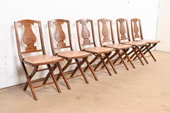 Antique Arts & Crafts Carved Oak Lyre Back Folding Chairs by Phoenix Chair Co.