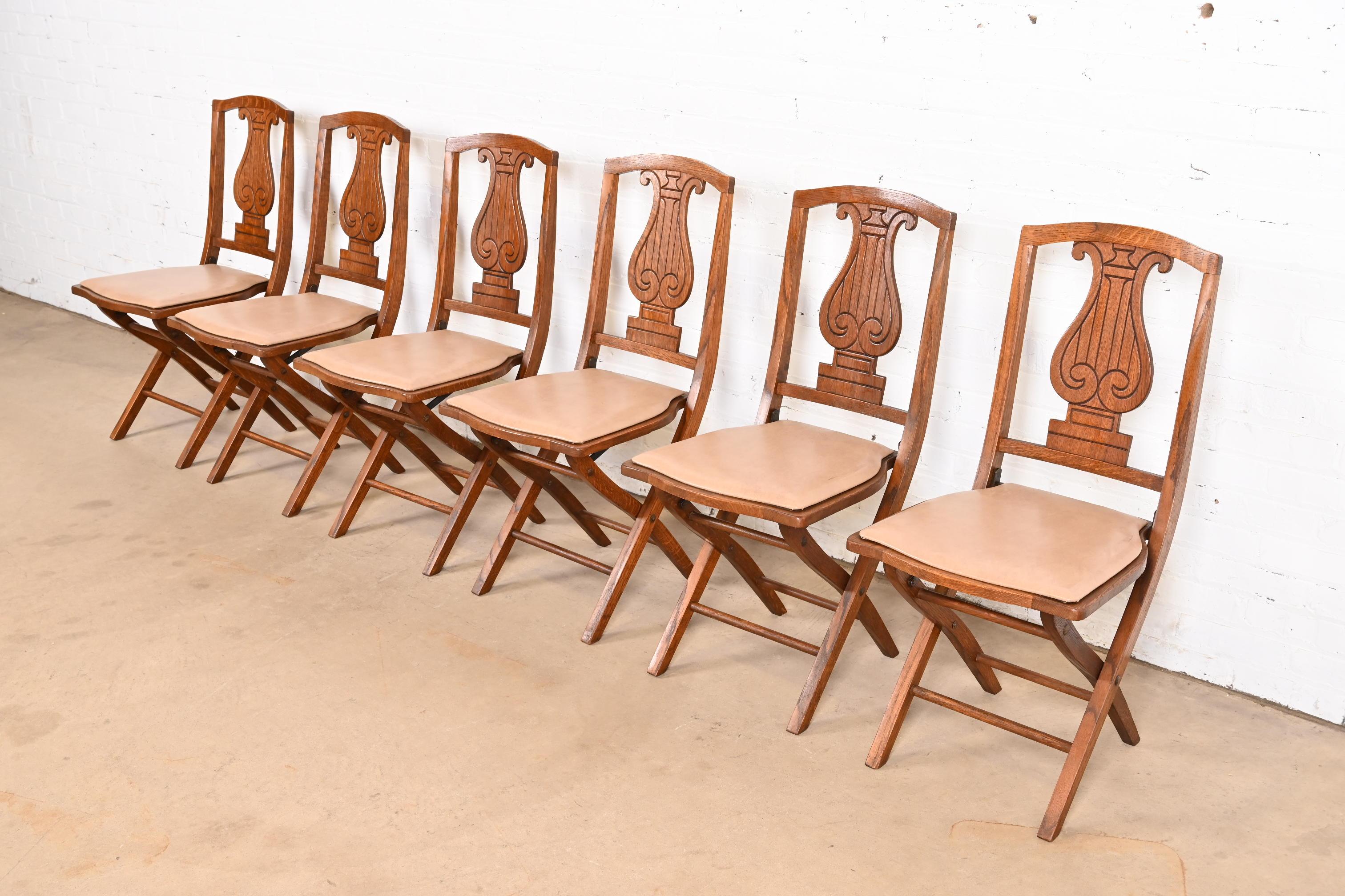 Arts and Crafts Antique Arts & Crafts Carved Oak Lyre Back Folding Chairs by Phoenix Chair Co. For Sale