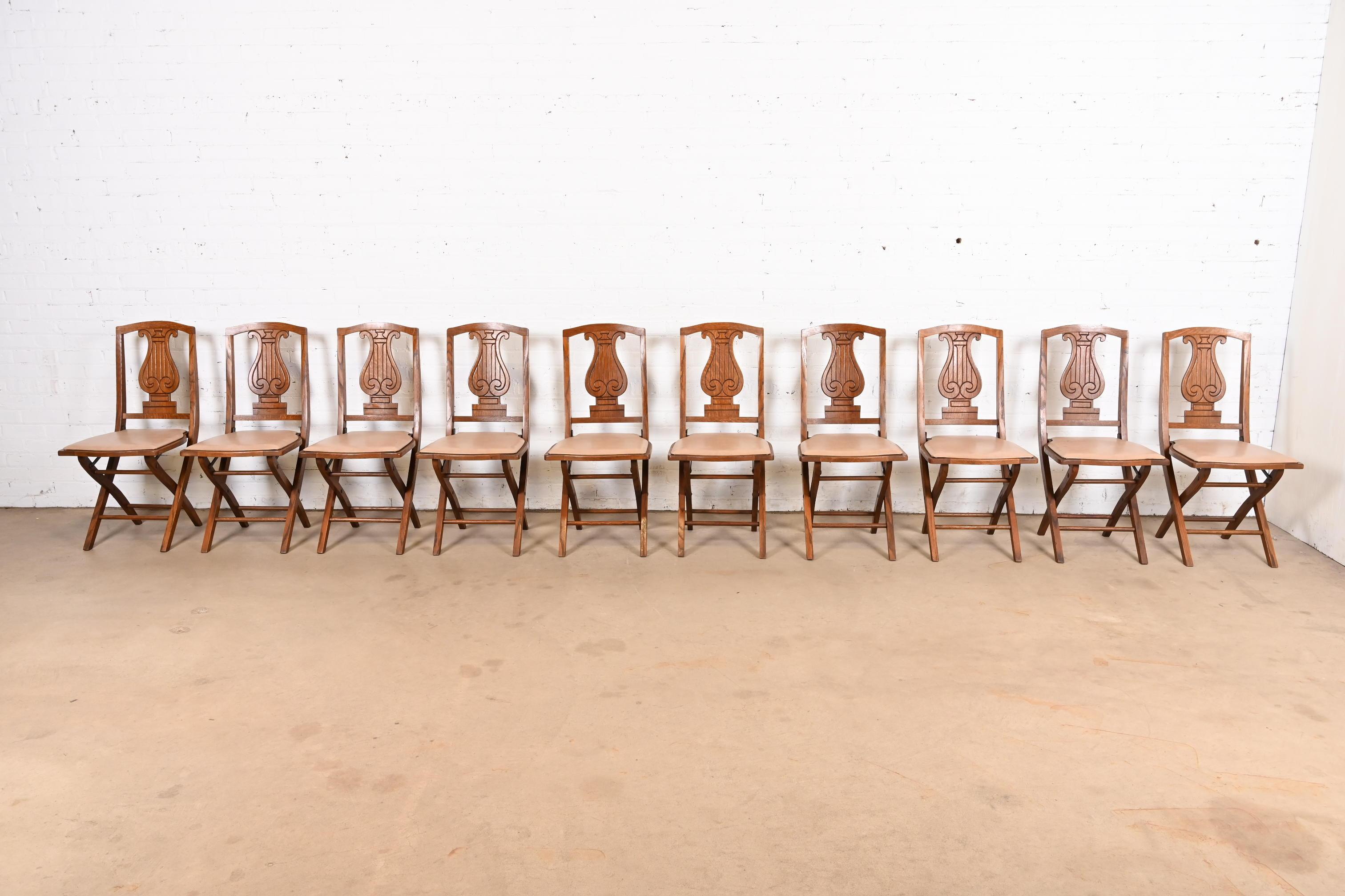 Antique Arts & Crafts Carved Oak Lyre Back Folding Chairs by Phoenix Chair Co. In Good Condition For Sale In South Bend, IN