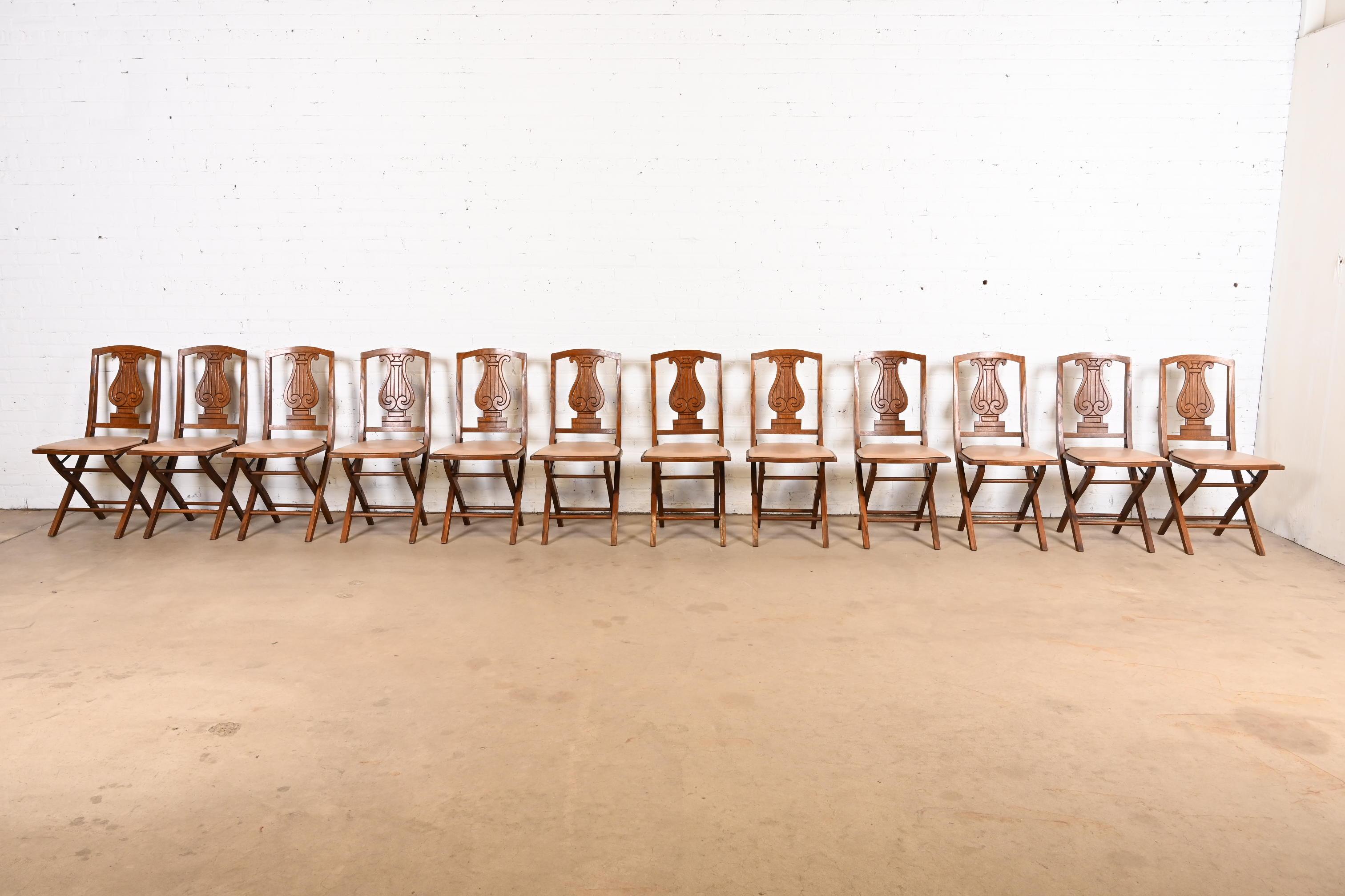 Antique Arts & Crafts Carved Oak Lyre Back Folding Chairs by Phoenix Chair Co. In Good Condition For Sale In South Bend, IN