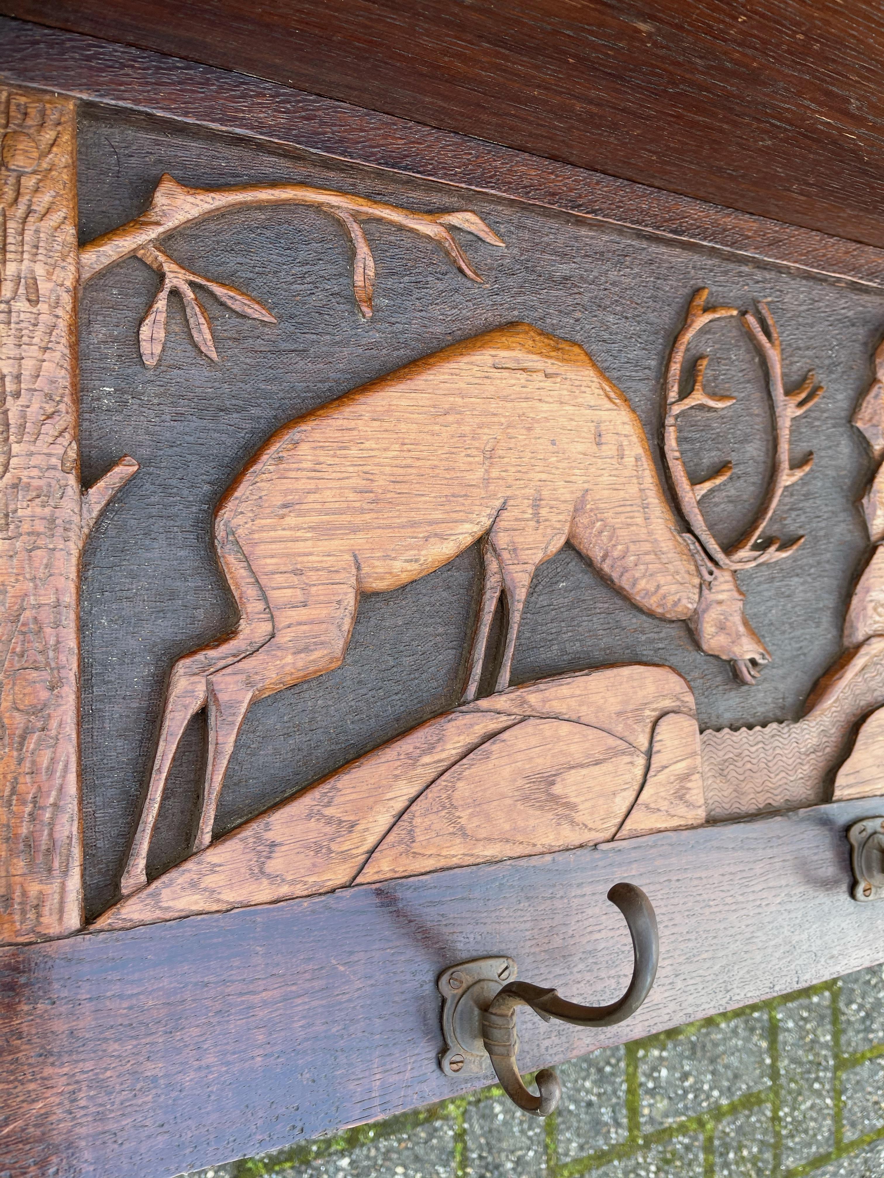 Antique Arts & Crafts Coat Rack w. Brass Hooks & A Carved Decor of a Deer Fight 1
