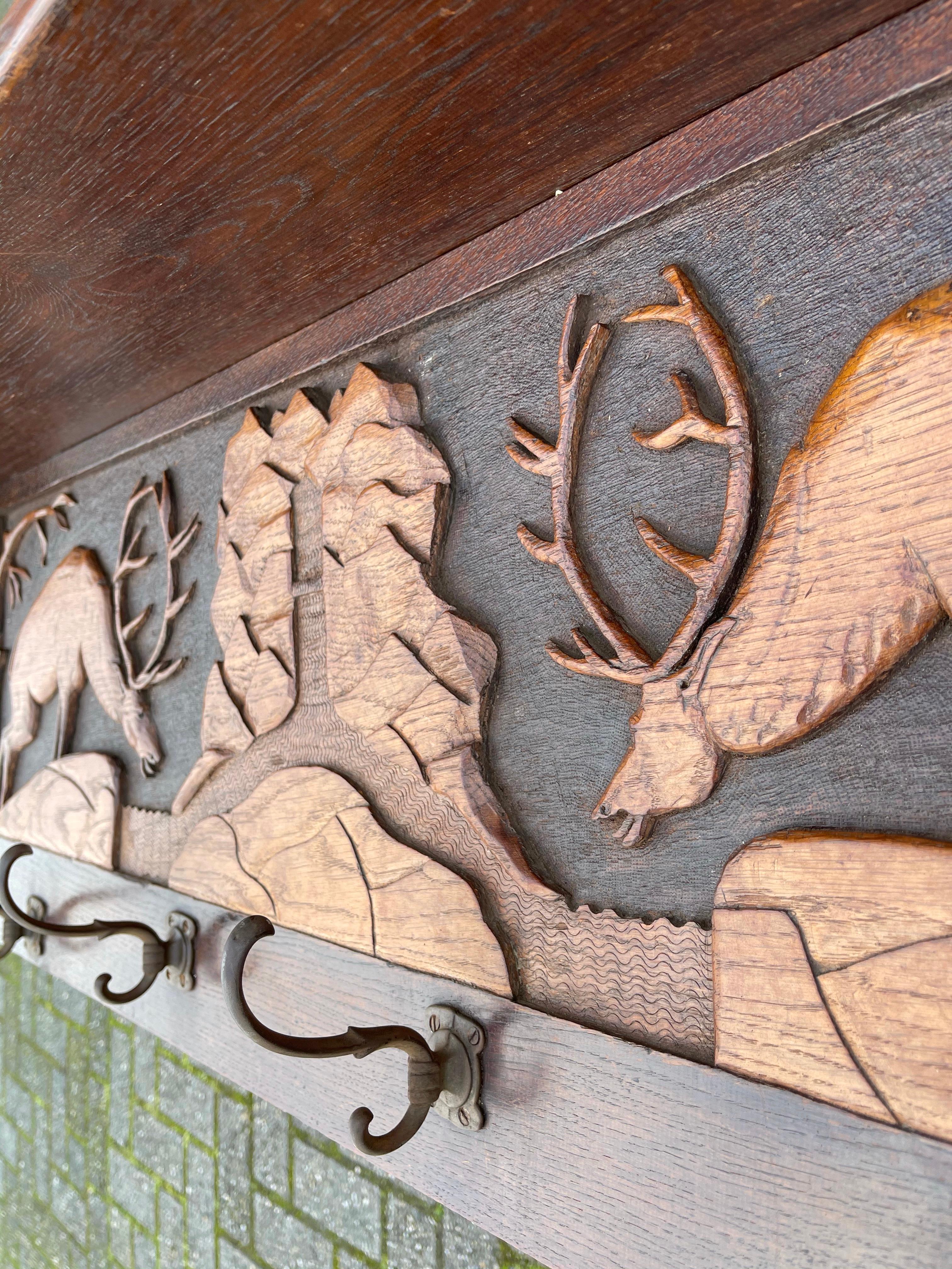 Antique Arts & Crafts Coat Rack w. Brass Hooks & A Carved Decor of a Deer Fight In Excellent Condition In Lisse, NL