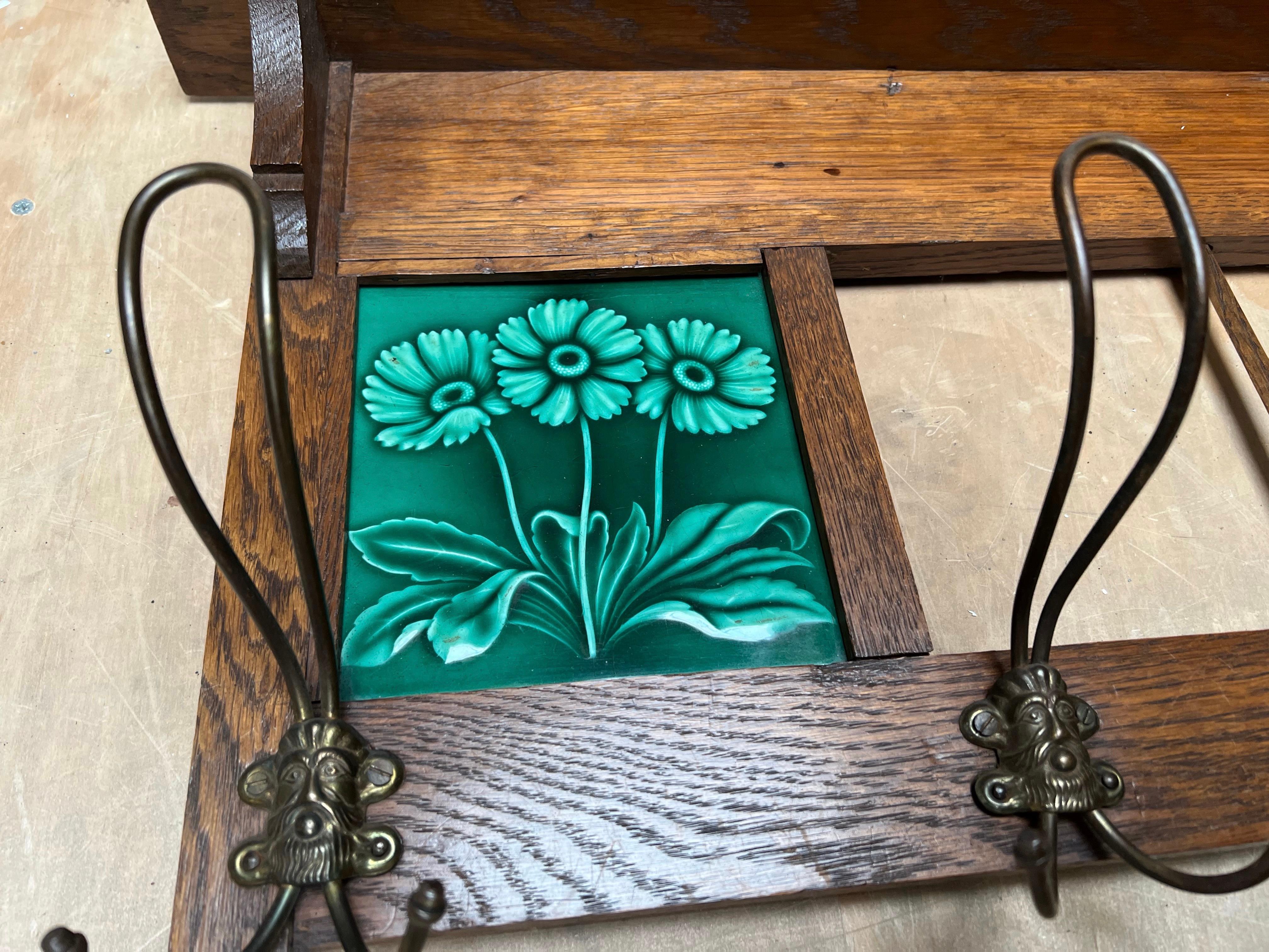 European Antique Arts & Crafts Coat Rack with Majolica Glazed, Stylized Flower Tiles