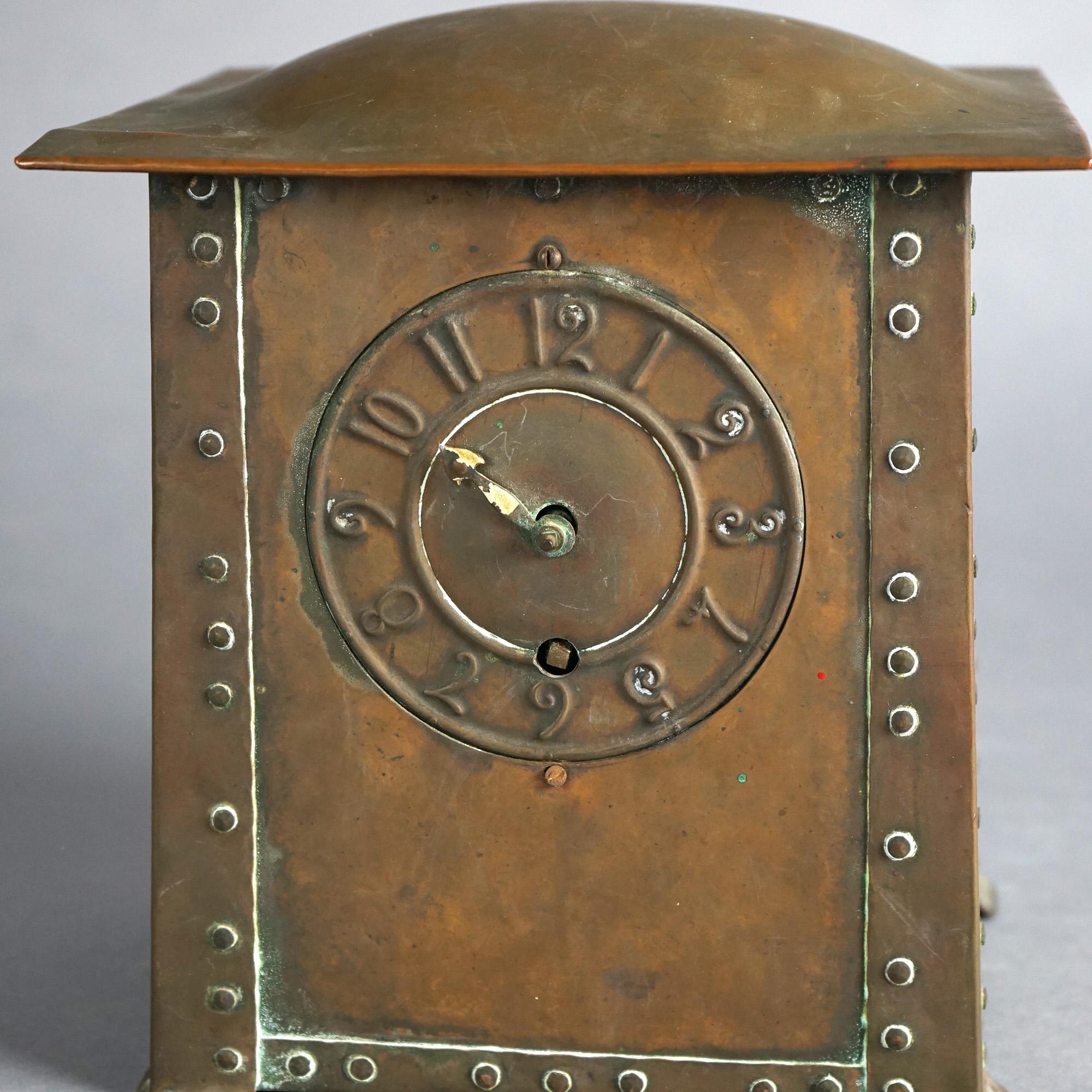 Antique Arts & Crafts Coventry Astral Hammered Copper Mantel Clock C1910

Measures- 9''H x 8''W x 6.75''D