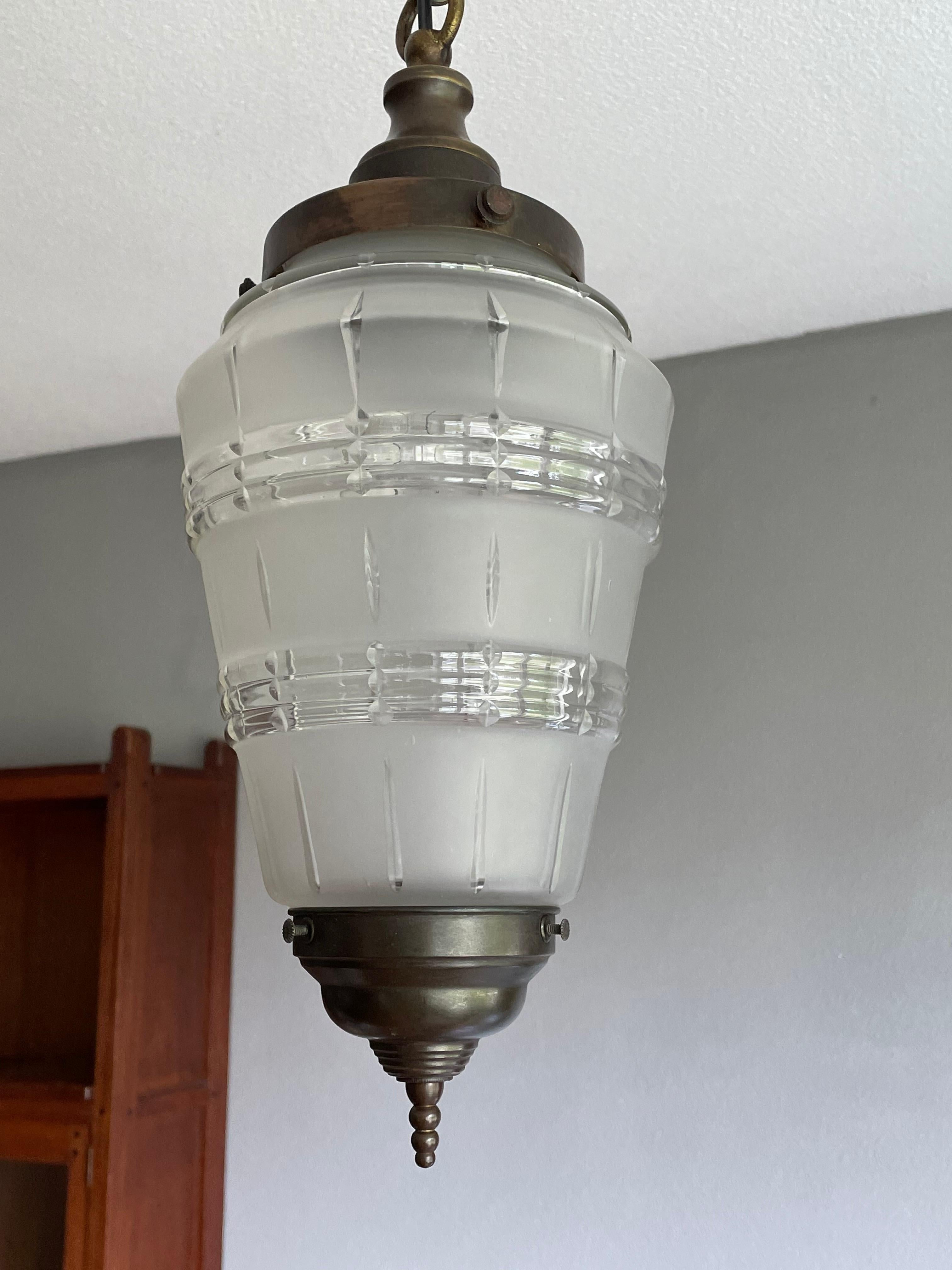 Stunning and stylish Arts and Crafts lantern or ceiling lamp.

This all handcrafted, practical size and great looking ceiling lamp is another one of our recent great finds. With early 20th century lighting as one of our specialities, we are always