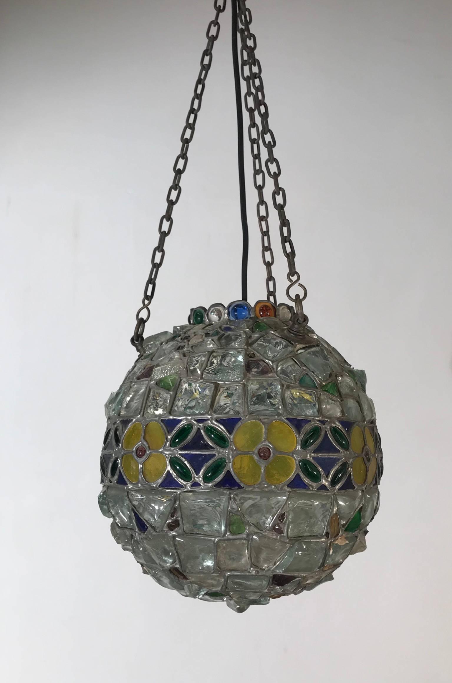 Stunning moon shape chandelier pendant light 1900s. 

This rare ceiling lamp from the very early 1900s could be the perfect lighting solution for an entrance or any other small living space. This globe design with the band of colorful and flowery