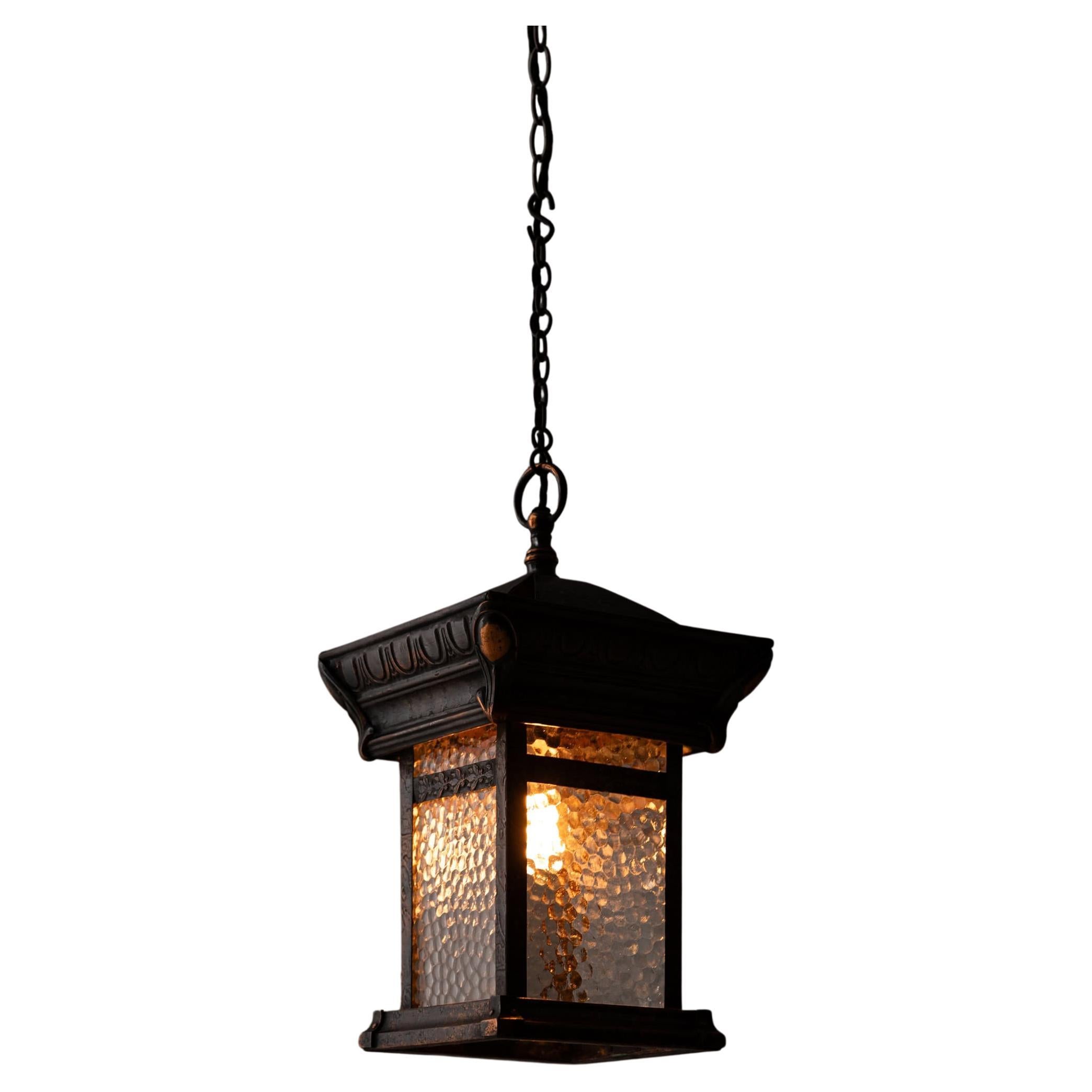 Beautifully formed glazed and copper hall/porch lantern. c.1920

A finely hand-crafted copper lantern, presented in original as found condition. The copper has developed a rich, natural patina throughout. Original 'hammered' glass panels present