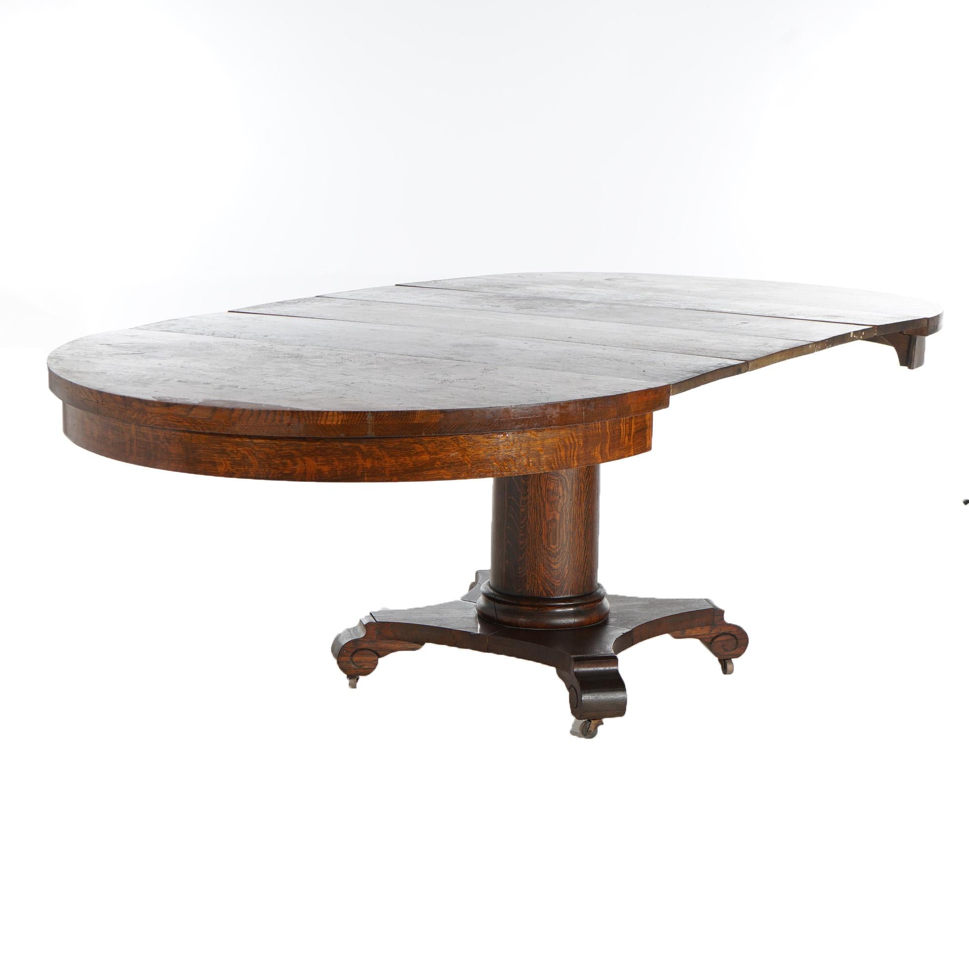 American Antique Arts & Crafts Indian Head Co. Oak Dining Table with Four Leaves, c1910