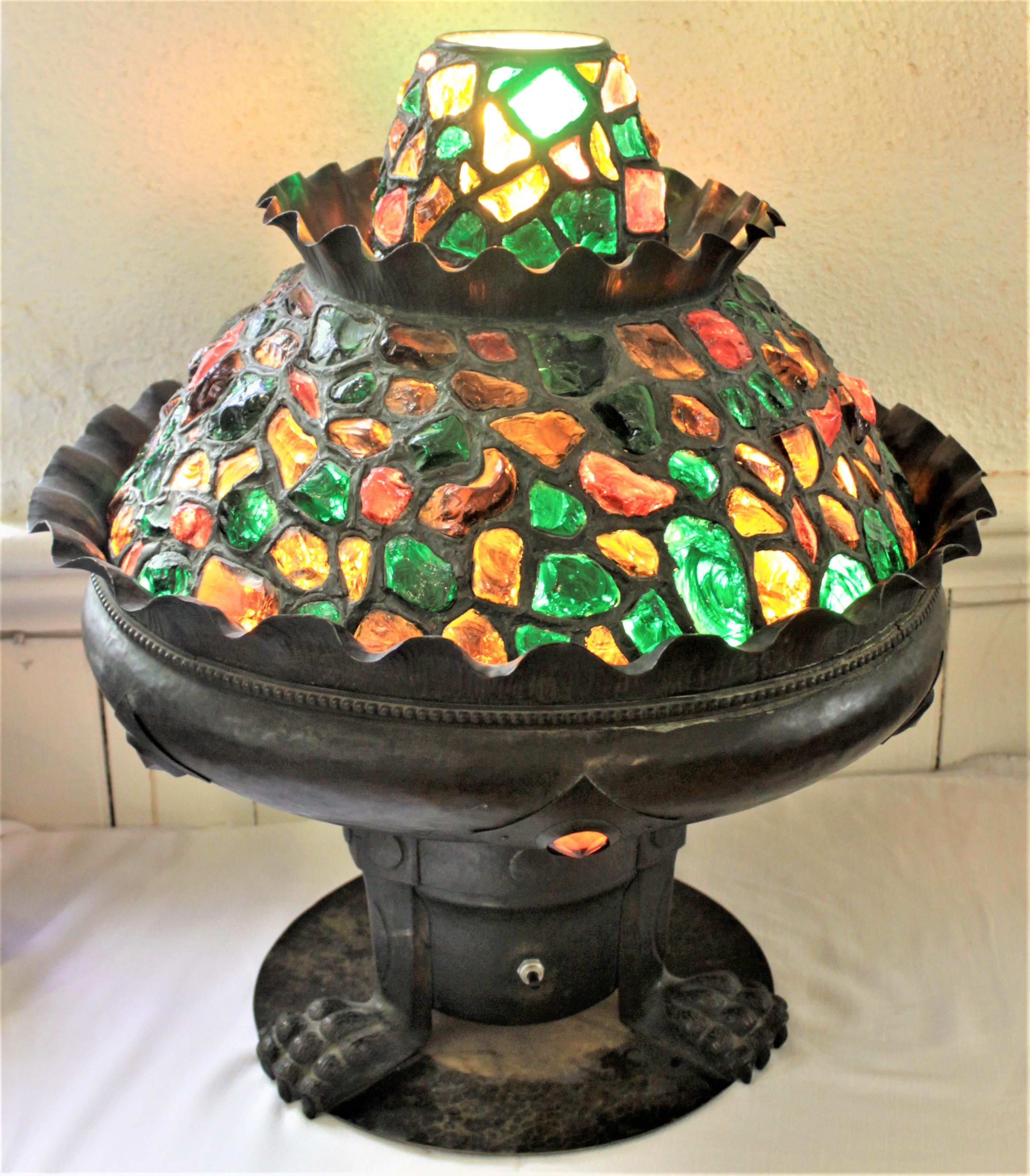 This large and substantial Arts & Crafts double domed light was once an indoor fountain and was presumed to have been made in the United States in circa 1900. The fountain component of the fountain is no longer functional as the pump has long since