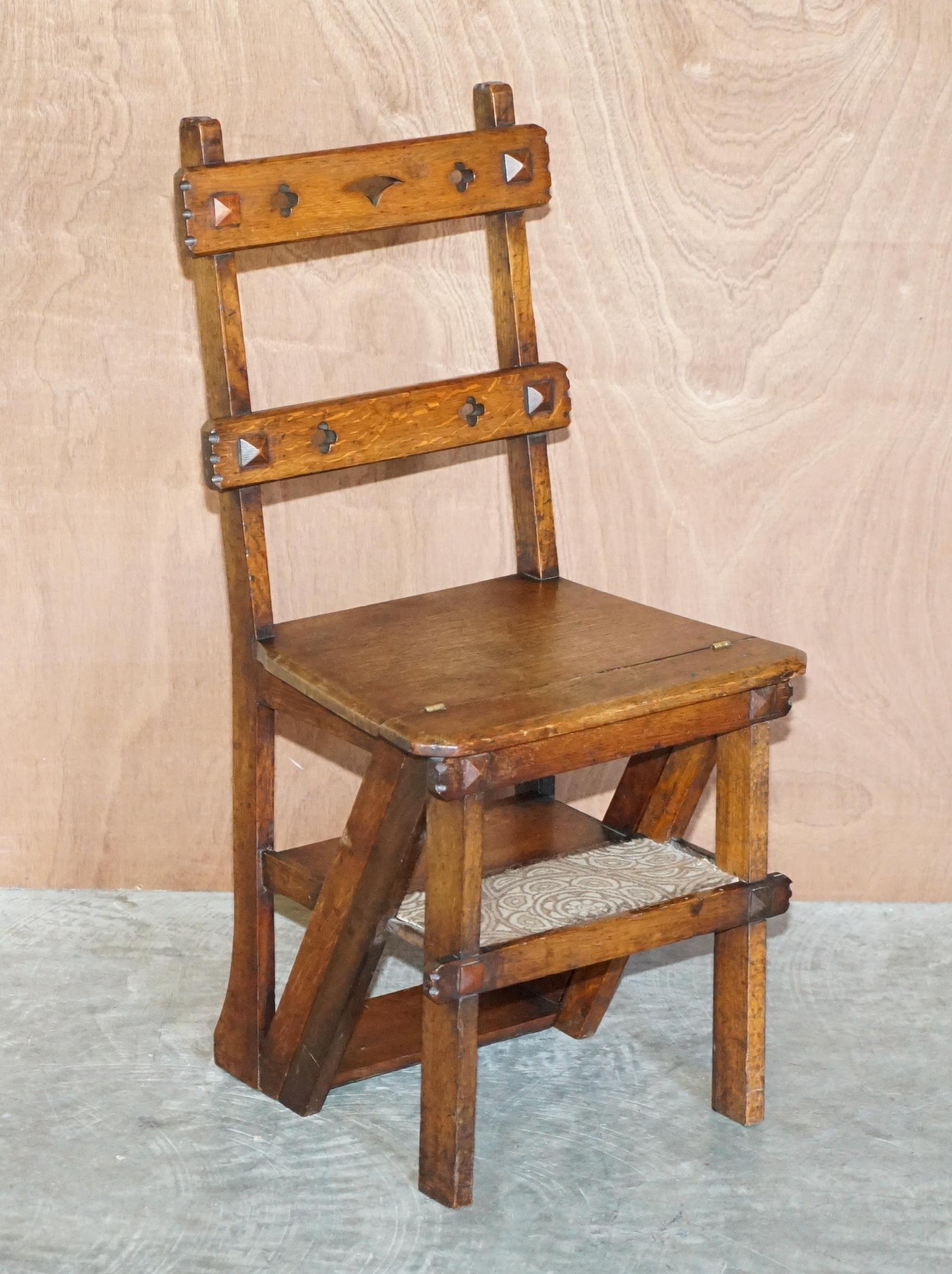 We are delighted to offer for sale this lovely antique Arts & Crafts Victorian metamorphic library steps chair in oak with William Morris Carpet steps 

A very charming and highly collectable piece, designed as an at home library steps and reading