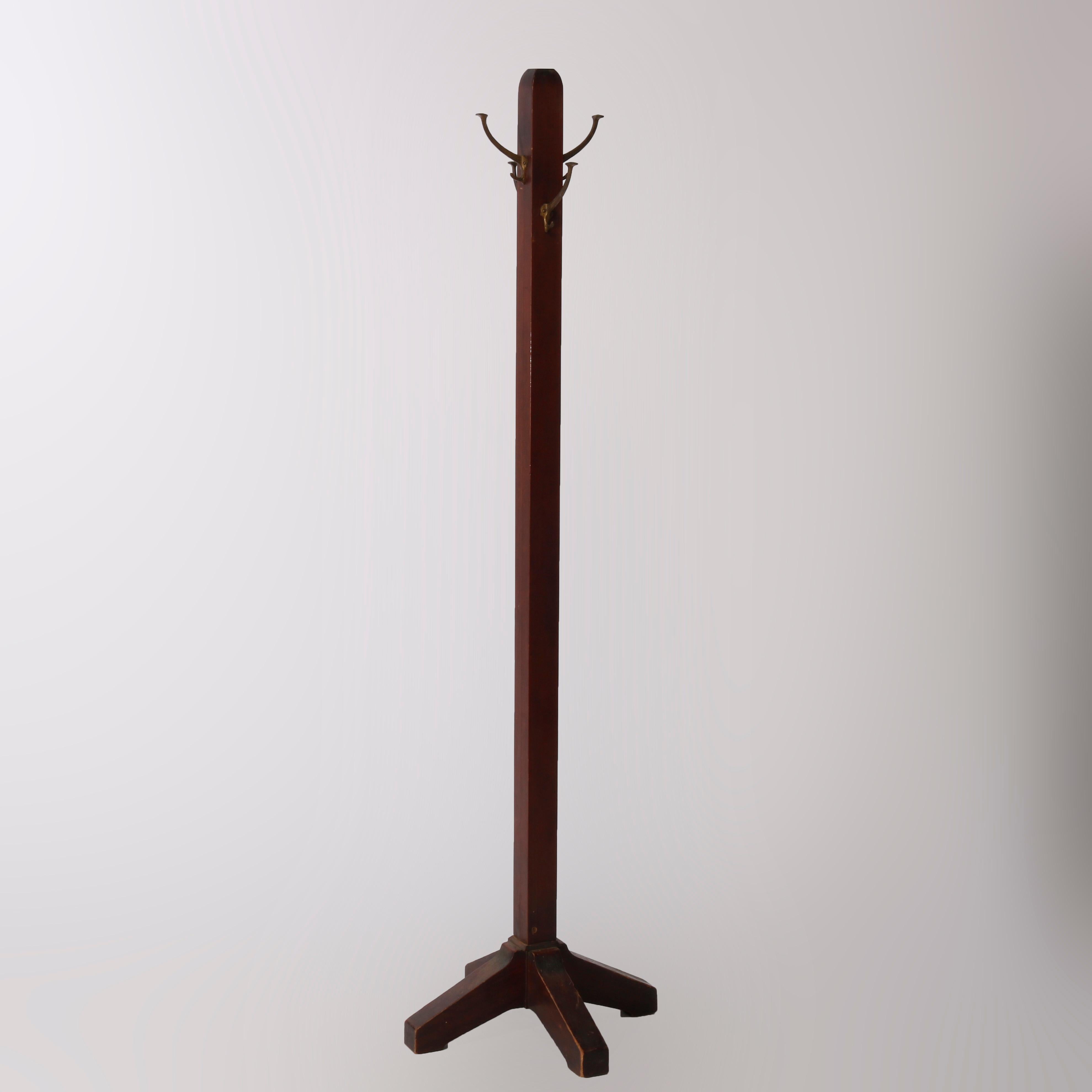 An antique Arts & Crafts Mission hall tree offers mahogany construction with rounded top and raised on tapered legs, c1910

Measures - 72'' H x 20.5'' W x 20.5'' D.