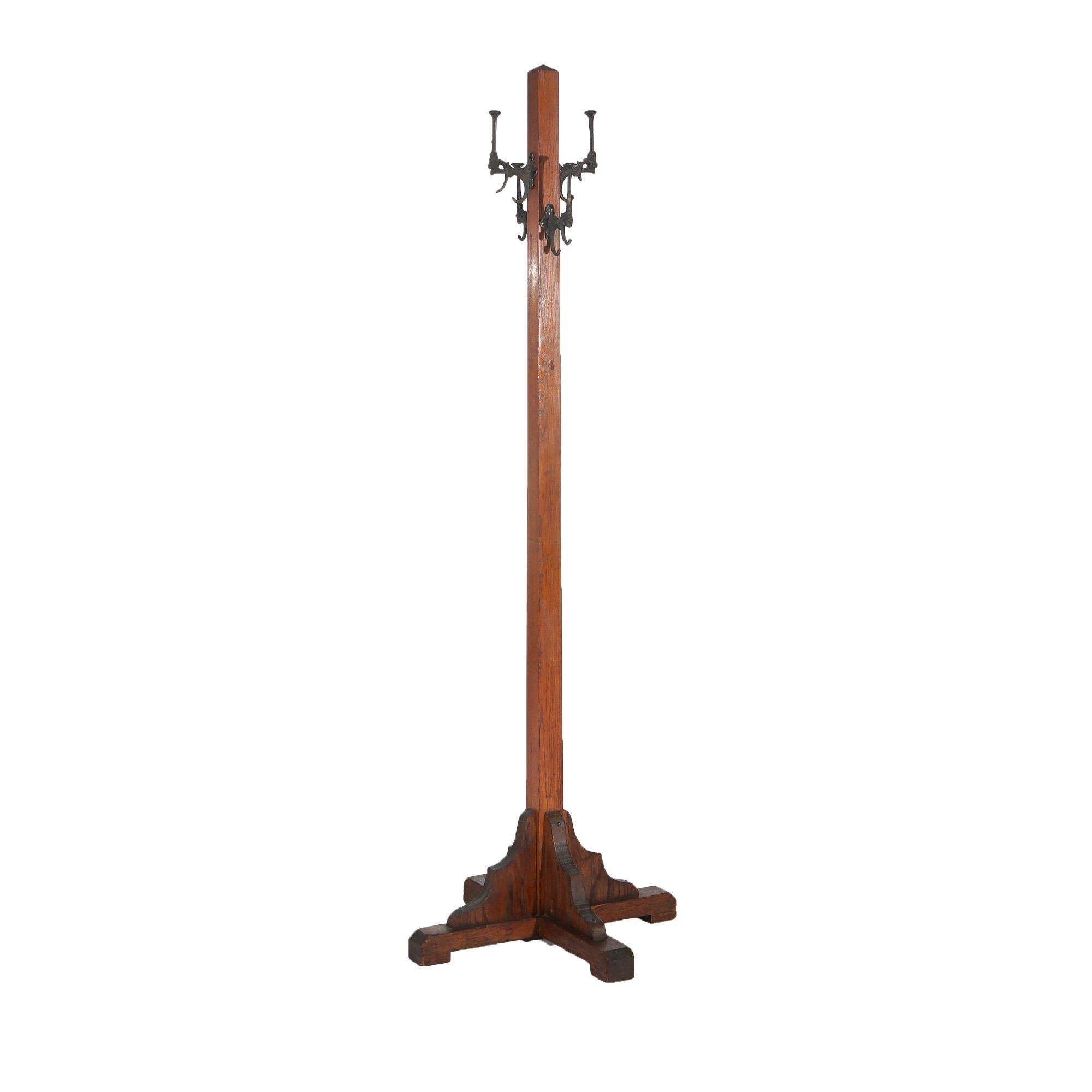 20th Century Antique Arts & Crafts Mission Oak Hat Tree with Gargoyle Form Cast Iron Hooks