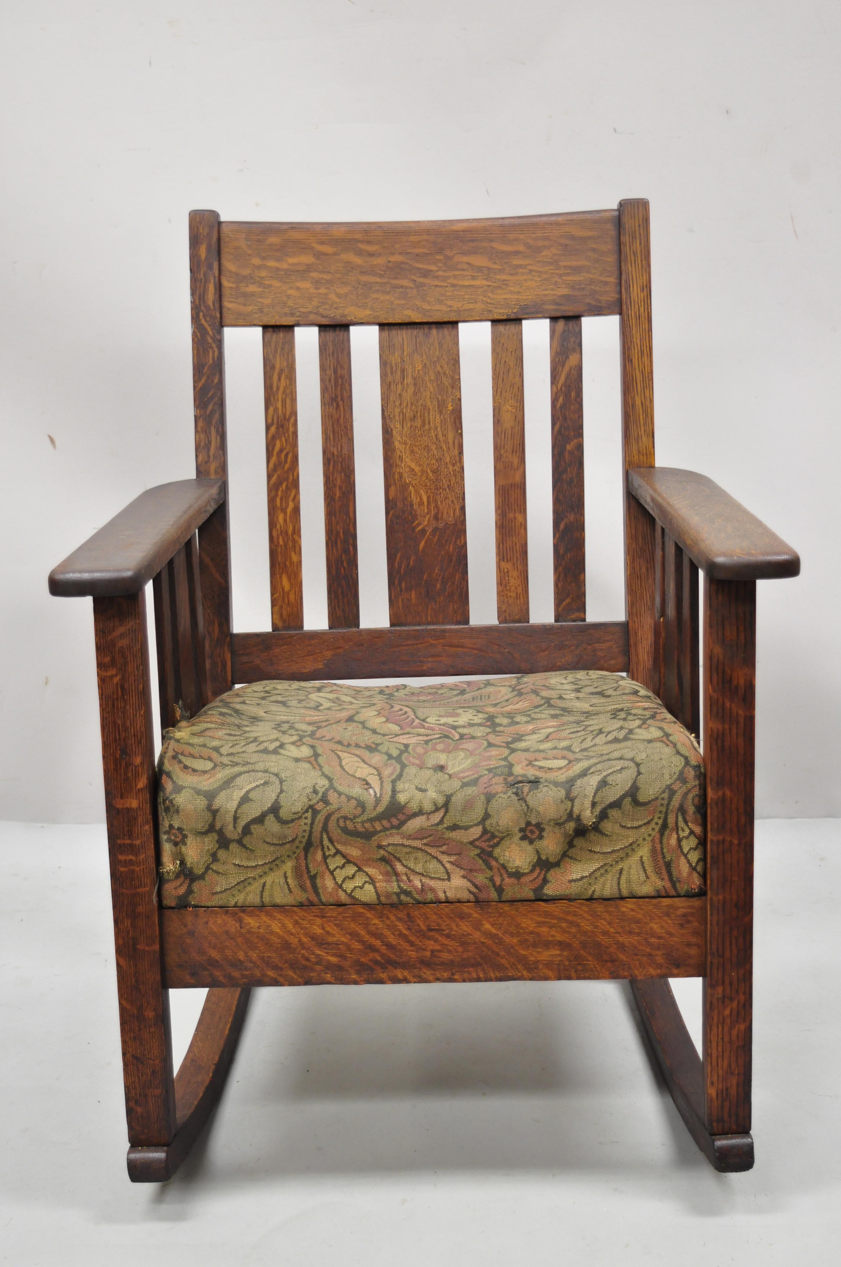 Antique Arts & Crafts Mission oak stickley style slat back rocker rocking chair. Item features slat back and sides, upholstered drop seat, solid wood frame, beautiful wood grain, very nice antique item, great style and form. Maker unknown, Circa