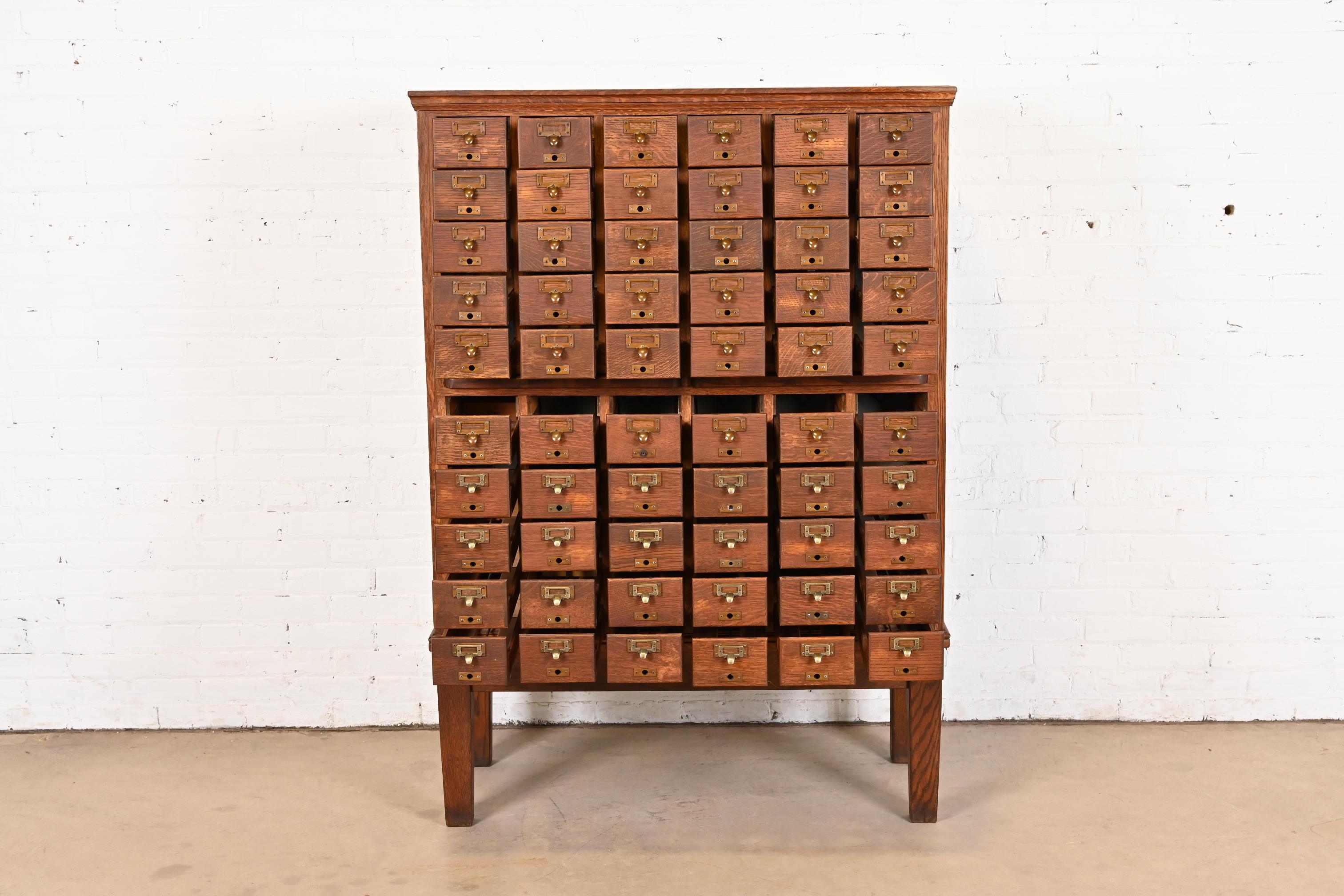 Antique Arts & Crafts Oak 60-Drawer Card Catalog Filing Cabinet, Circa 1900 In Good Condition In South Bend, IN