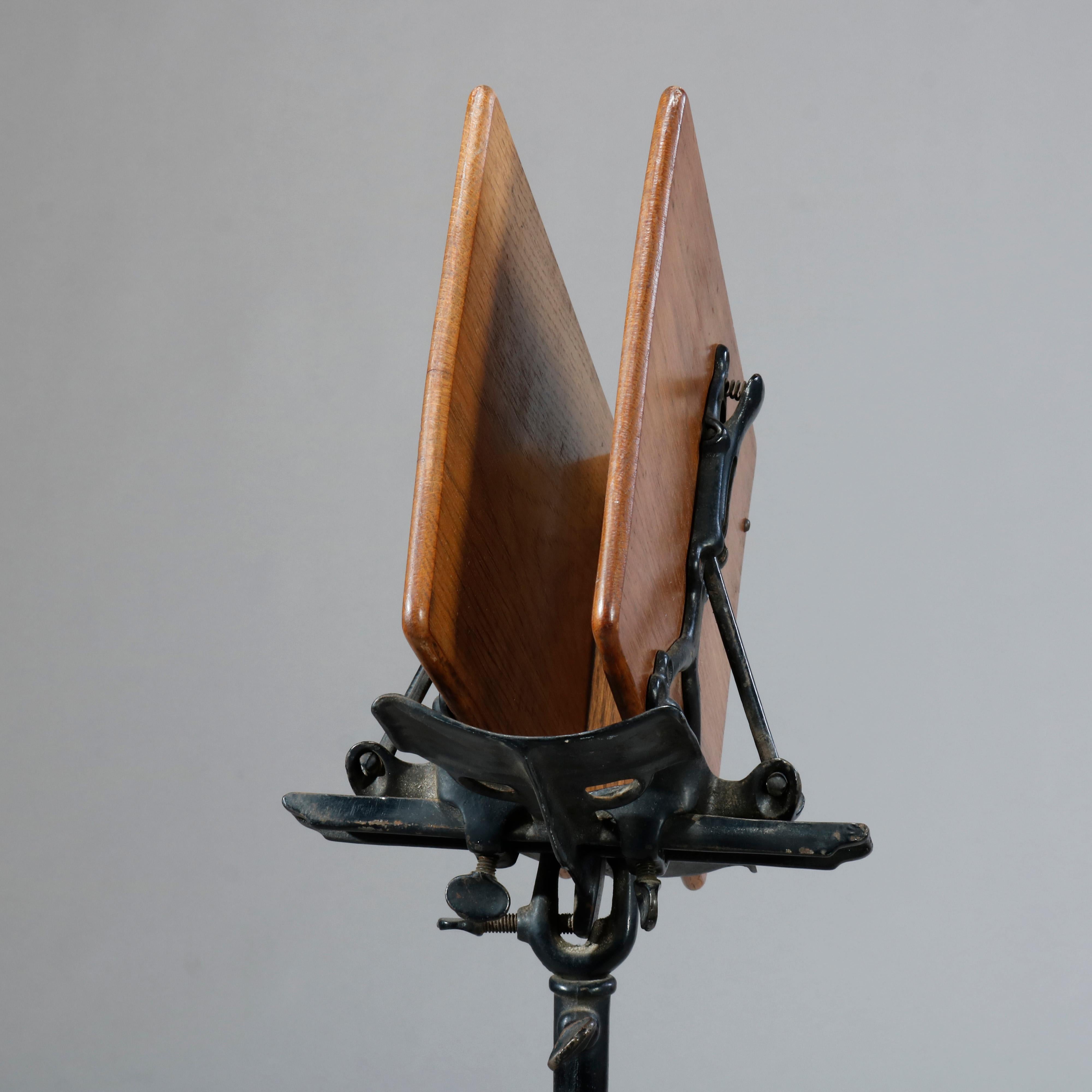 antique cast iron book stand