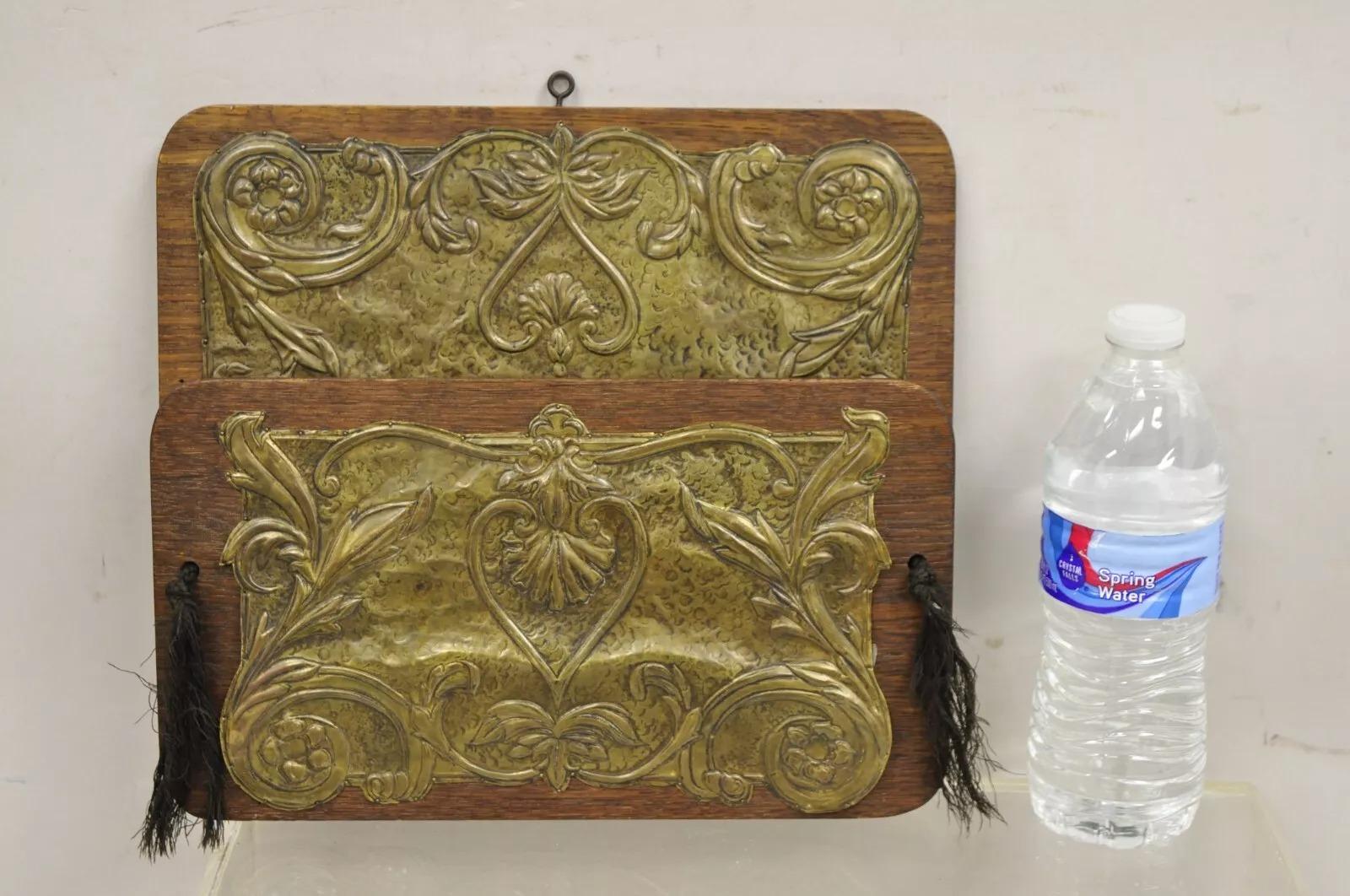 Antique Arts & Crafts Oak & Brass Embossed Folding Wall Hanging Letter Holder. Circa Mid 20th Century. Measurements: 10.5