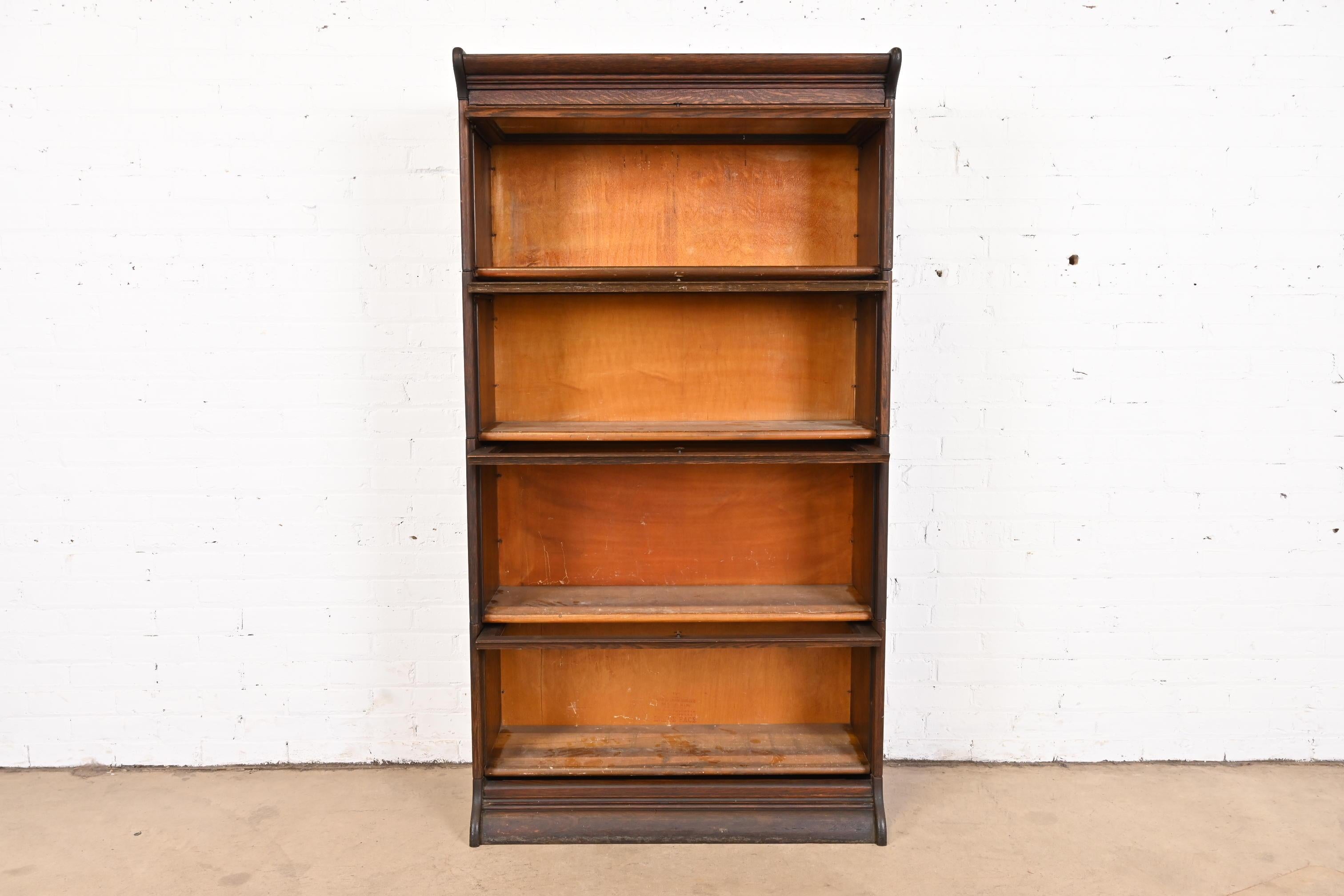 Antique Arts & Crafts Oak Four-Stack Barrister Bookcase by Gunn, circa 1920s In Good Condition For Sale In South Bend, IN