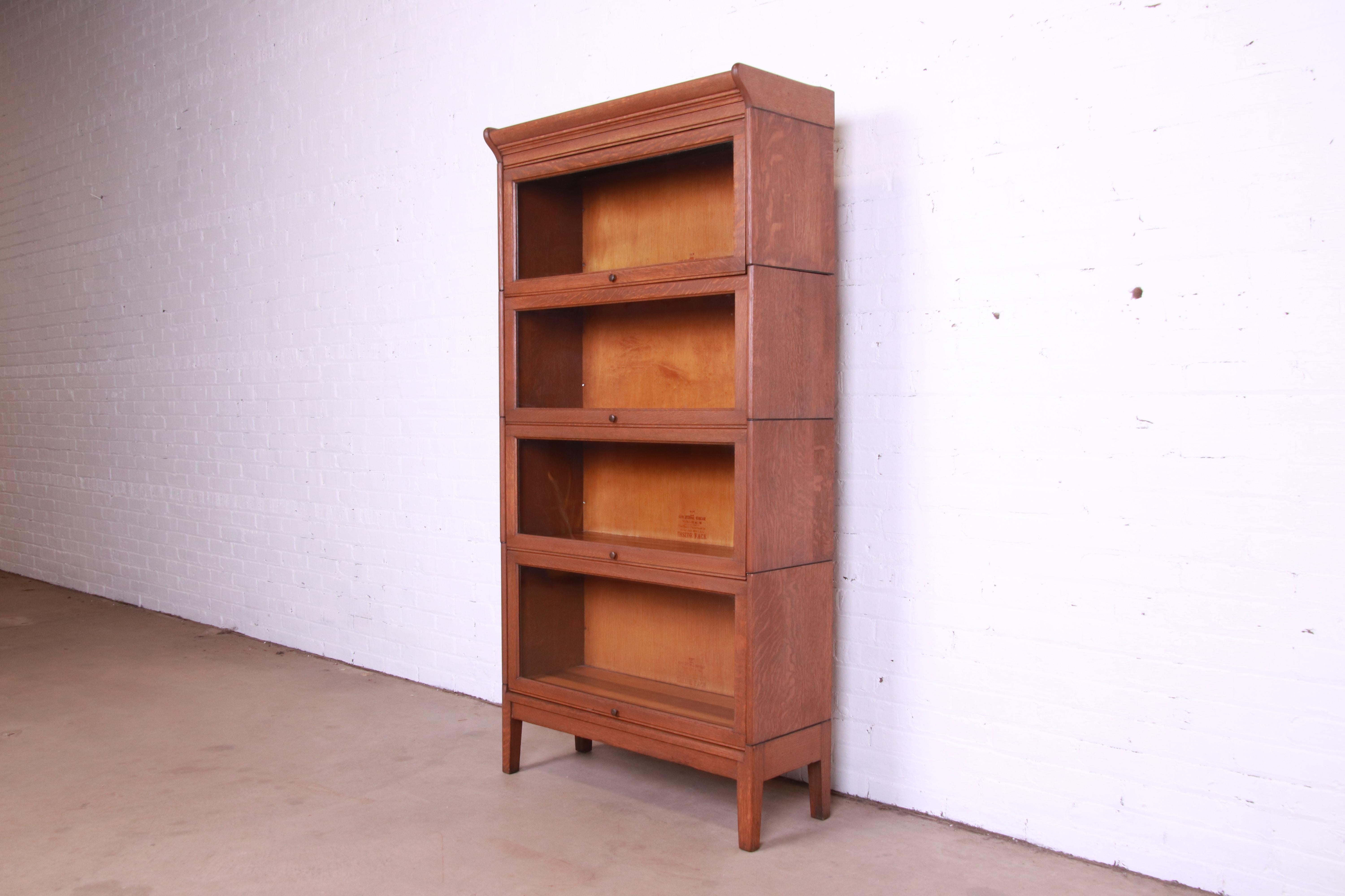 Antique Arts & Crafts Oak Four-Stack Barrister Bookcase by Gunn Furniture, 1920s In Good Condition In South Bend, IN