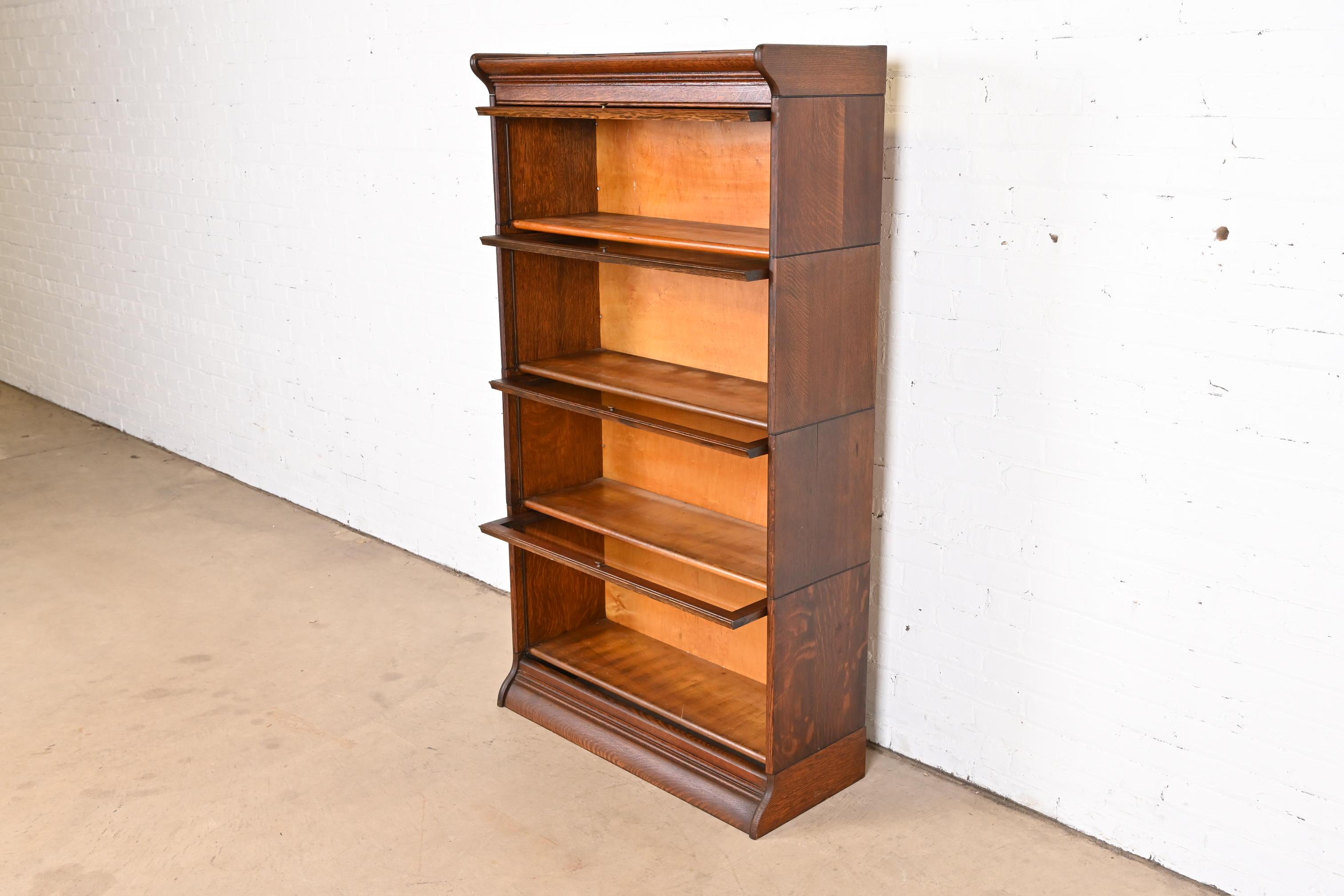 Antique Arts & Crafts Oak Four-Stack Barrister Bookcase by Gunn Furniture, 1920s In Good Condition For Sale In South Bend, IN