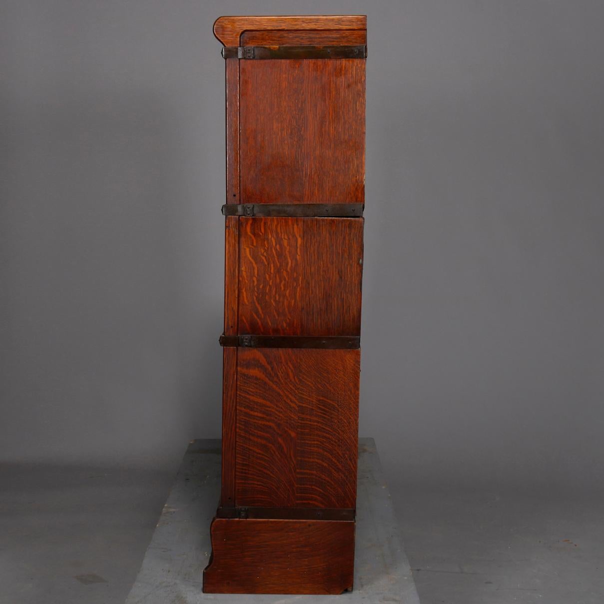 Carved Arts & Crafts Oak Globe Wernicke Three-Stack Barrister Bookcase, circa 1910