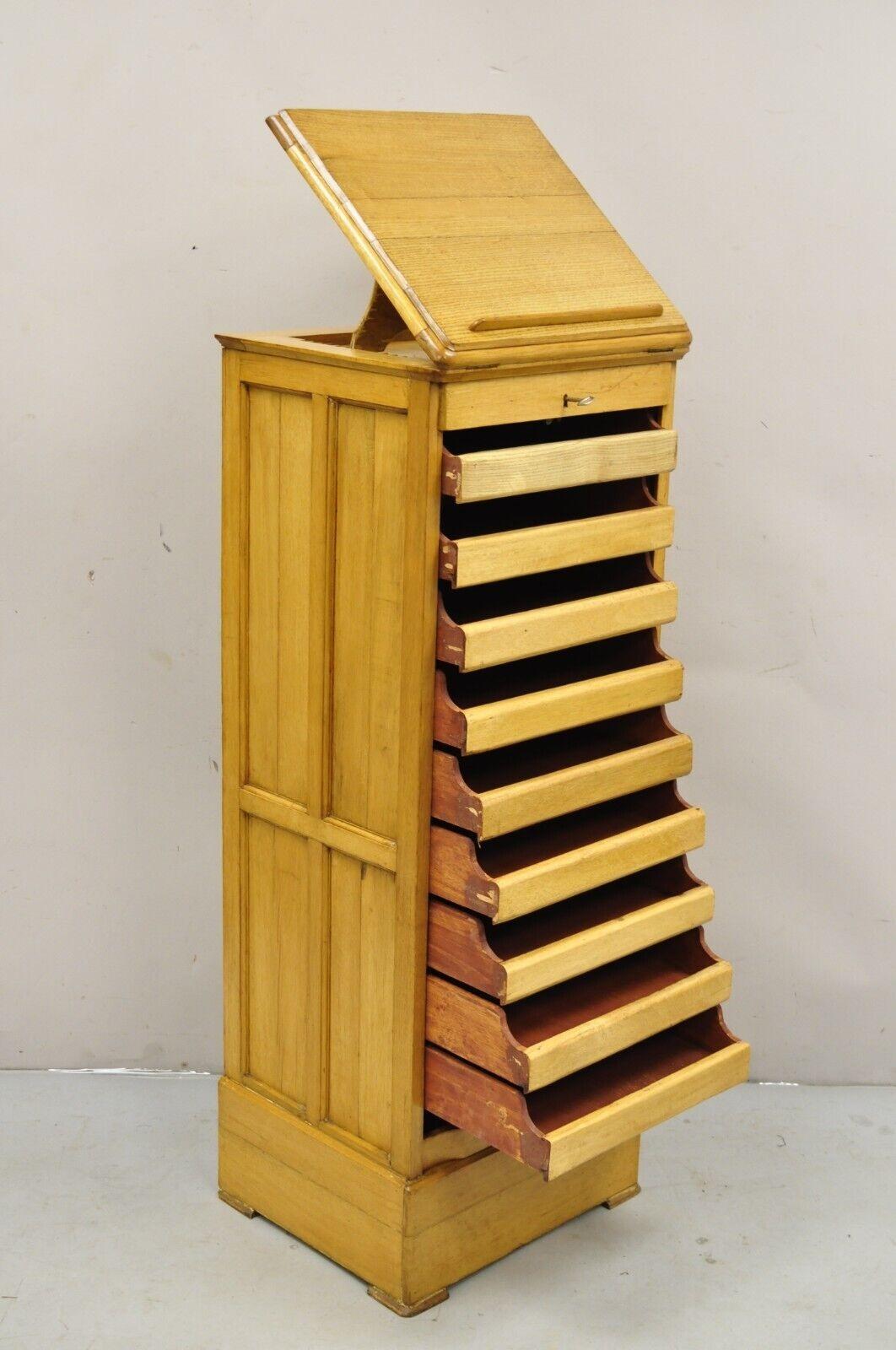 Antique Arts & Crafts Oak & Maple Wood Tambour Shutter Door File Cabinet.  ItemfWorking lock and key, adjustable tilt lectern bookstand top, 9 drawers, very unique antique filing cabinet.
Circa 1900. Measurements: 51