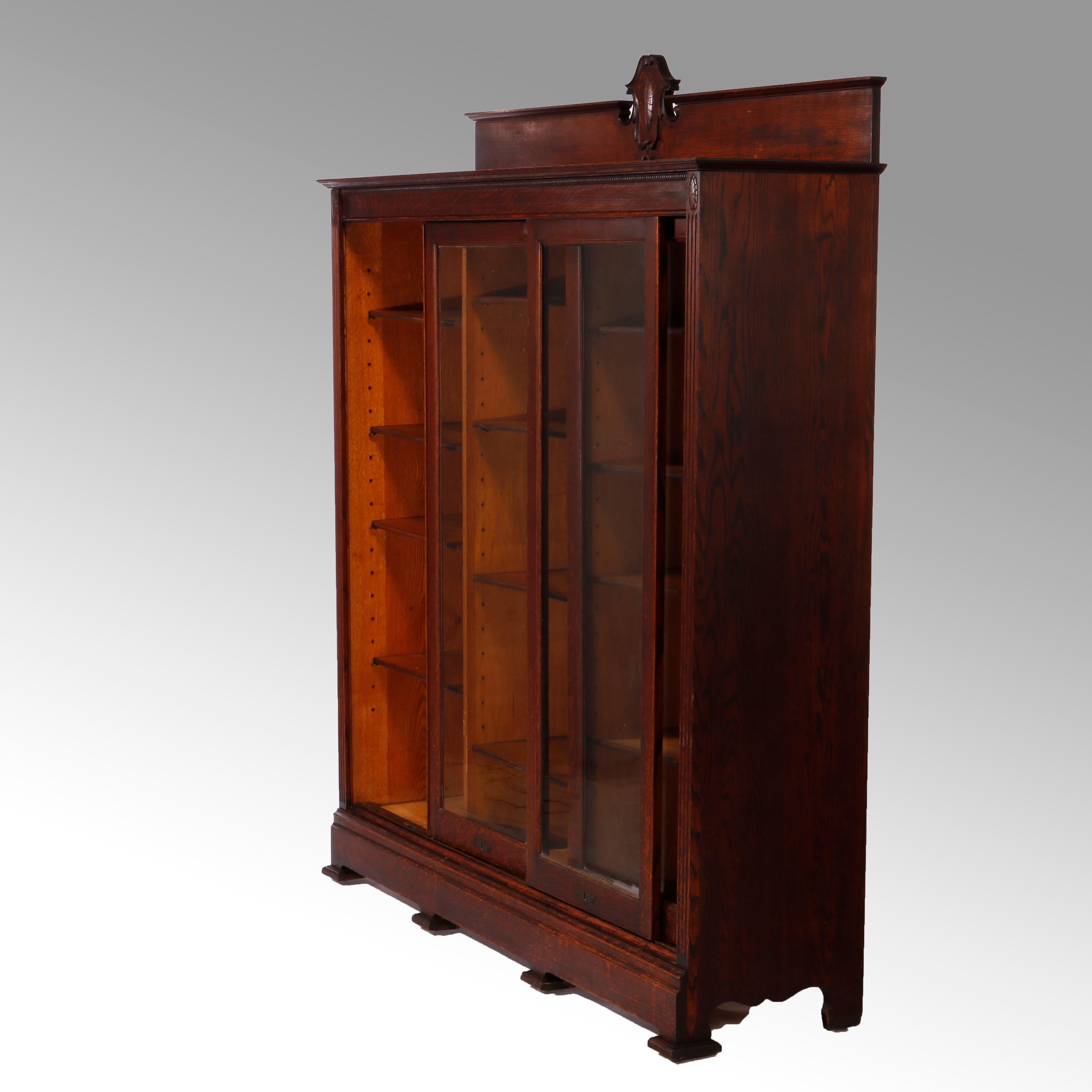 Antique Arts & Crafts Oak Triple Sliding Door Bookcase Circa 1910 In Good Condition In Big Flats, NY
