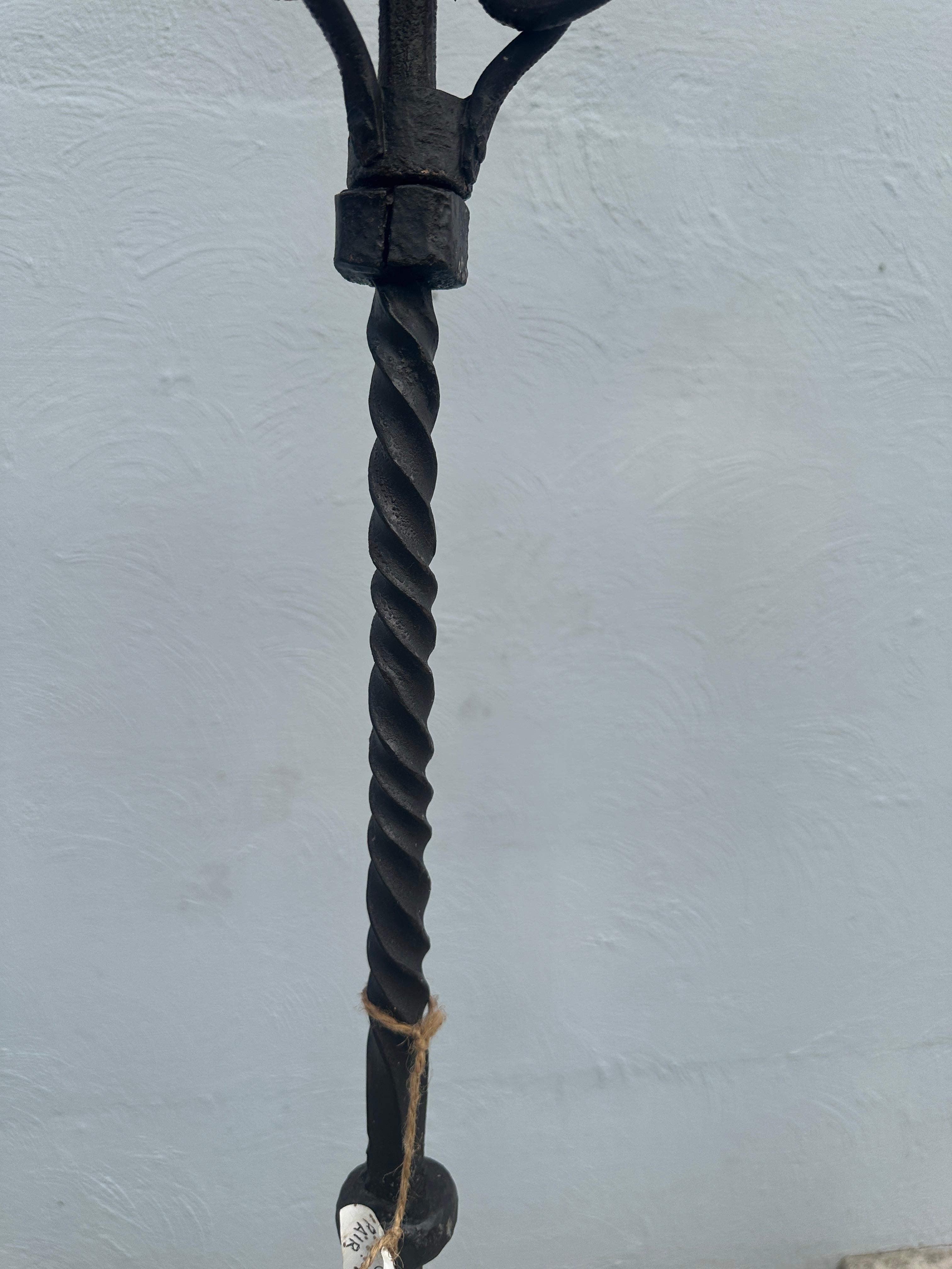 Antique Arts & Crafts Pair or Iron Floor Candle Holders, Stickley Era - W2123

This is a very nice pair of tall wrought iron candle holders in excellent condition. They were made in the early 1900s (Stickley era).  The top turns 360° to allow