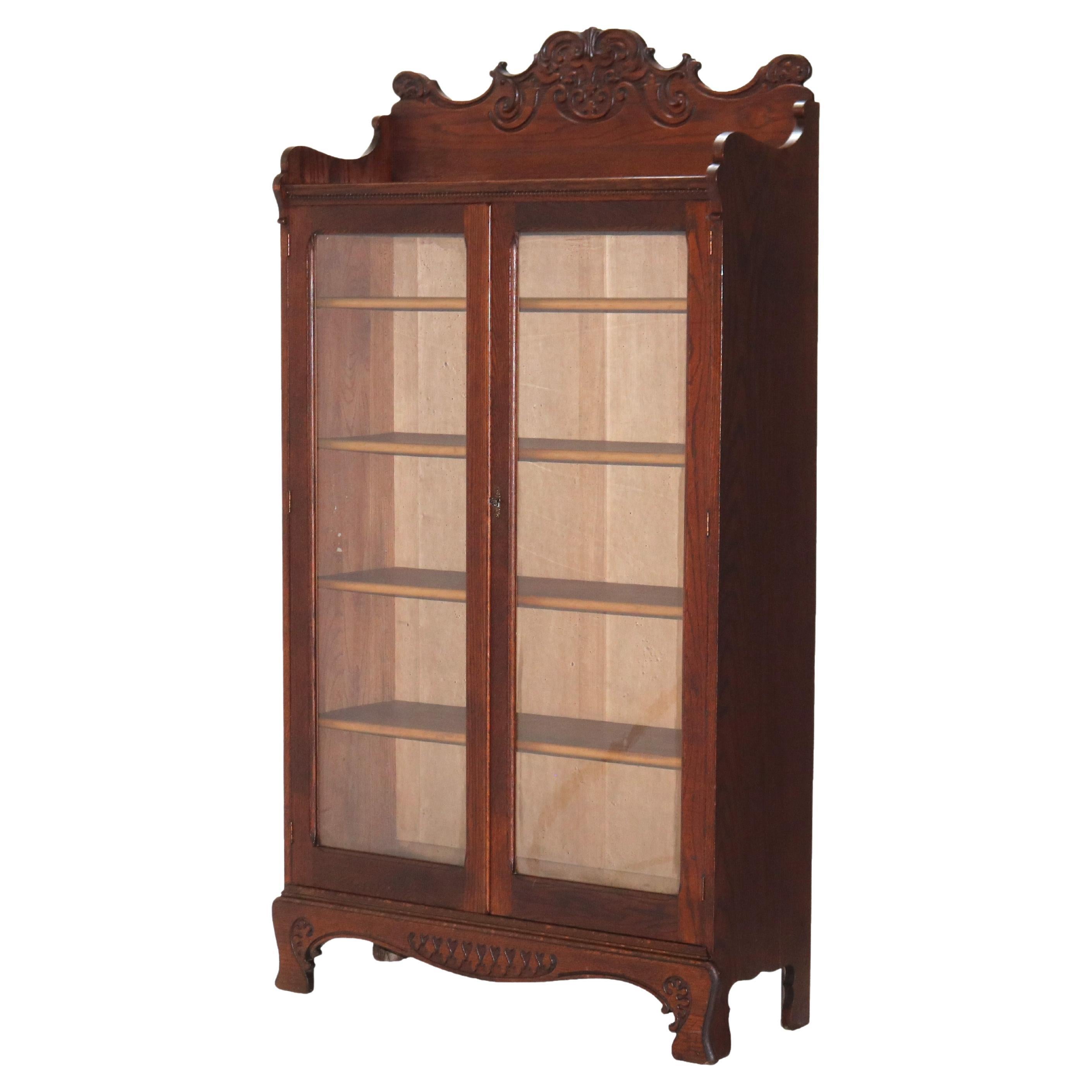 Antigua librería de doble puerta de roble prensado y tallado Arts & Crafts C1920
