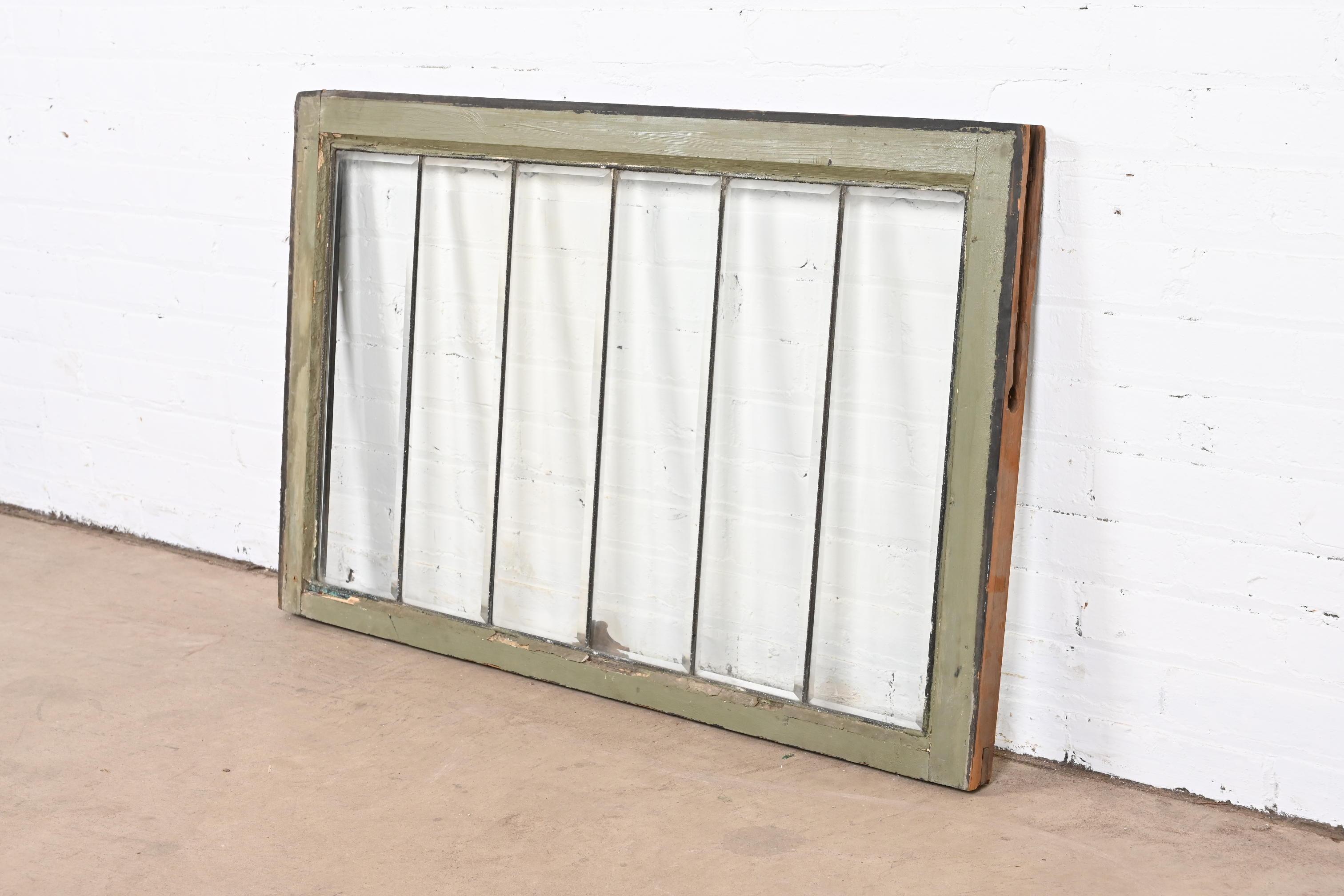 A gorgeous antique Arts & Crafts six-panel leaded beveled glass window

USA, Early 20th Century

Measures: 40