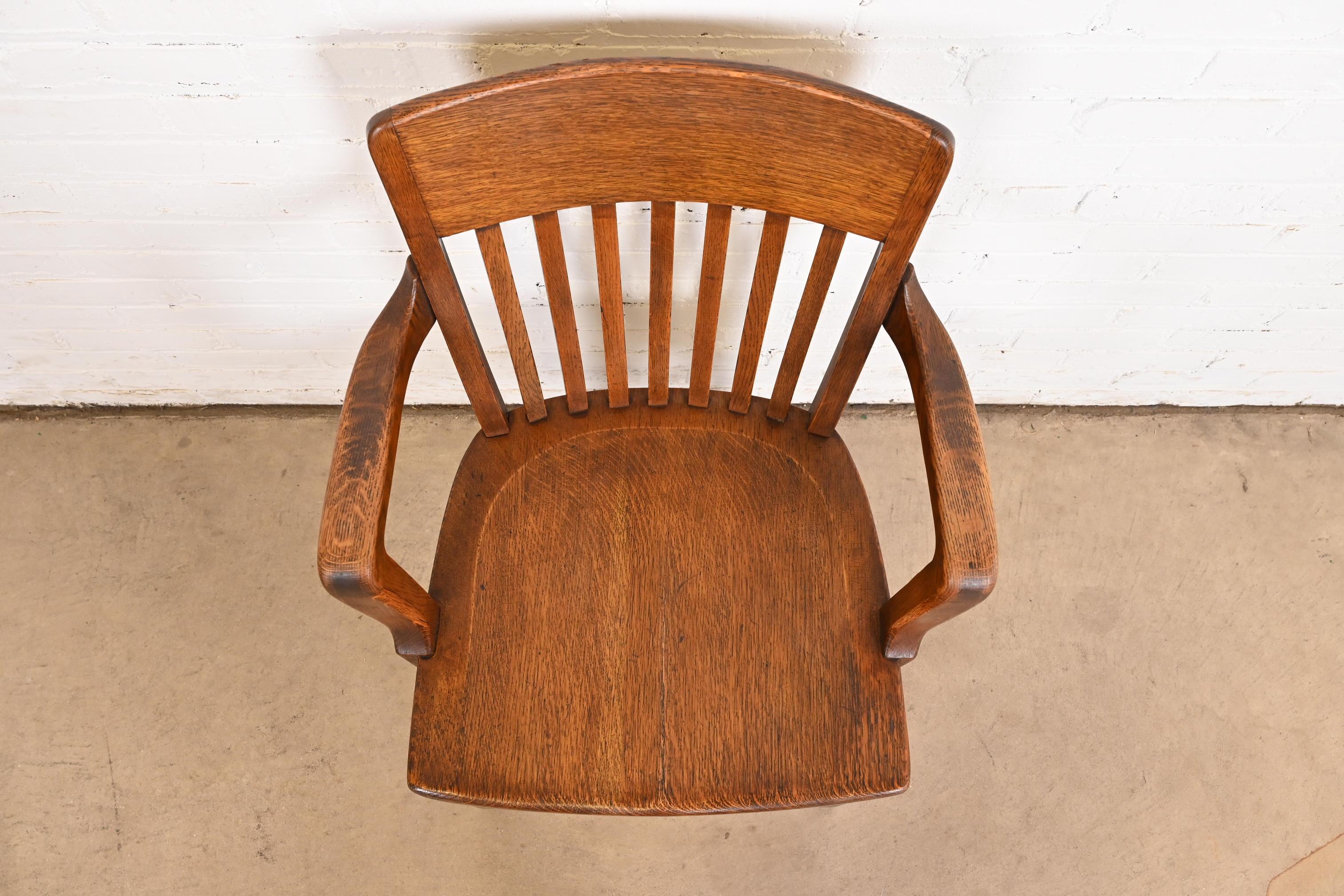 20th Century Antique Arts & Crafts Solid Oak Banker's Chair For Sale