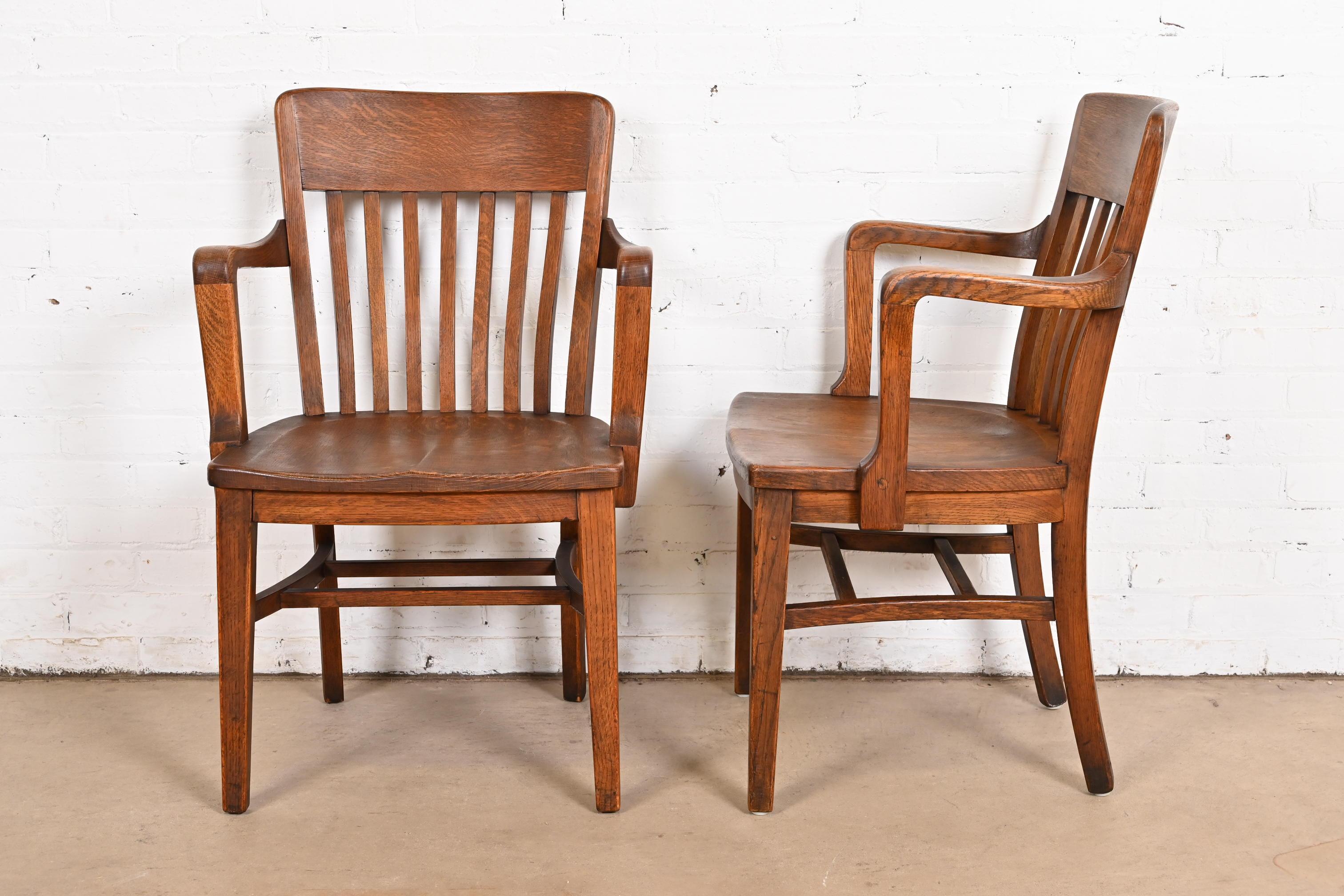 20th Century Antique Arts & Crafts Solid Oak Banker's Chairs, Pair For Sale