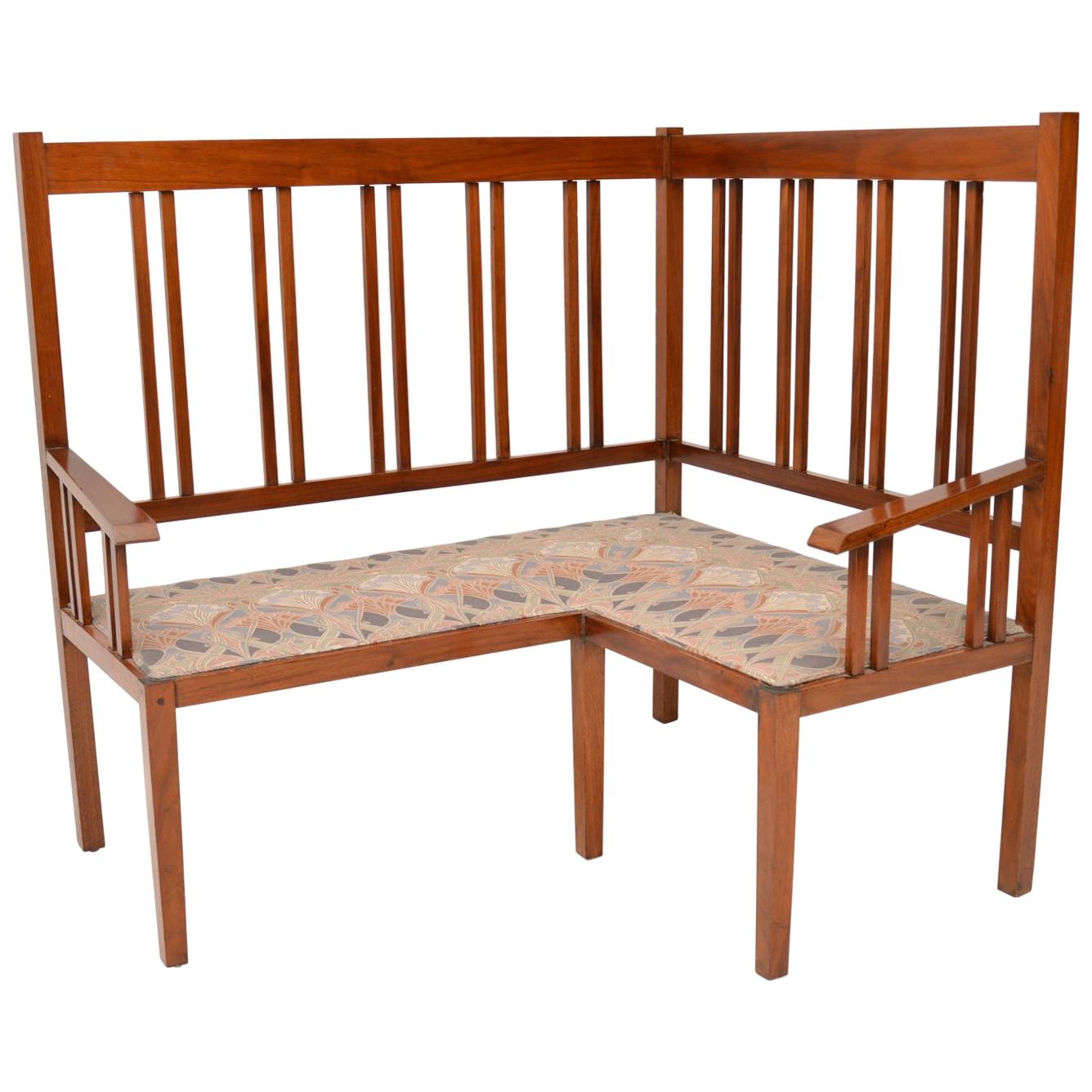 Antique Arts and Crafts Solid Walnut Corner Settee from Liberty of London For Sale at 1stDibs