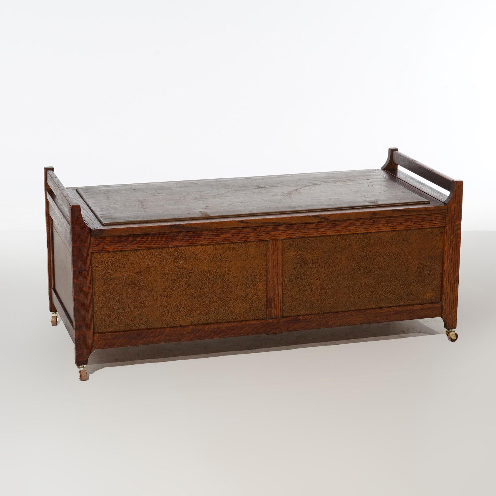 An antique Arts and Crafts blanket chest in the manner of Stickley offers paneled oak construction with leather top opening to cedar lined interior, c1910

Measures- 19.5''H x 45''W x 20.5''D.
 
Catalogue Note: Ask about DISCOUNTED DELIVERY RATES