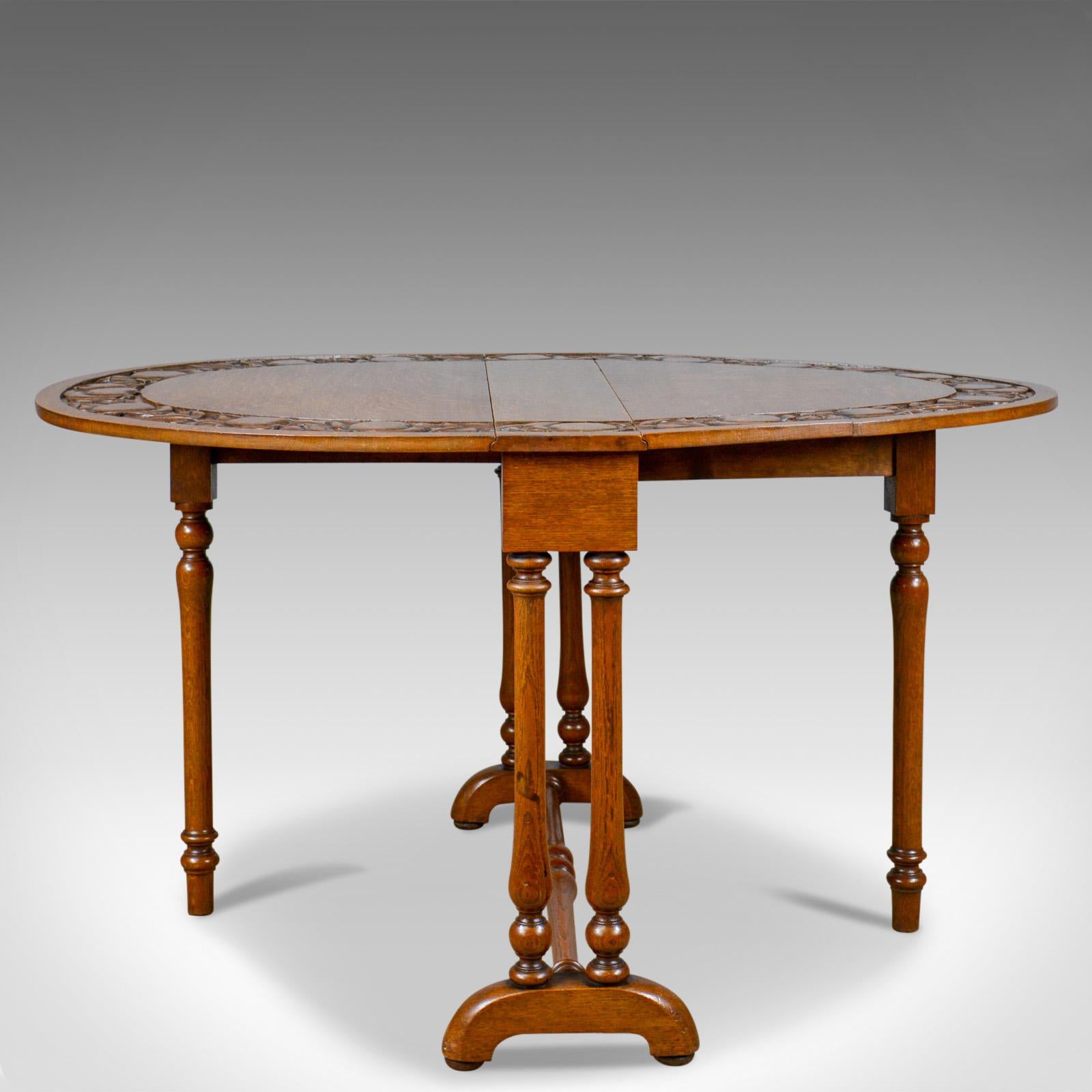 This is an antique, Arts & Crafts Sutherland table, an English, Liberty-esque, display, lamp occasional or centre table dating to circa 1900.

Beautifully crafted antique, Arts & Crafts table
English oak in warm, rich hues and a wax polished