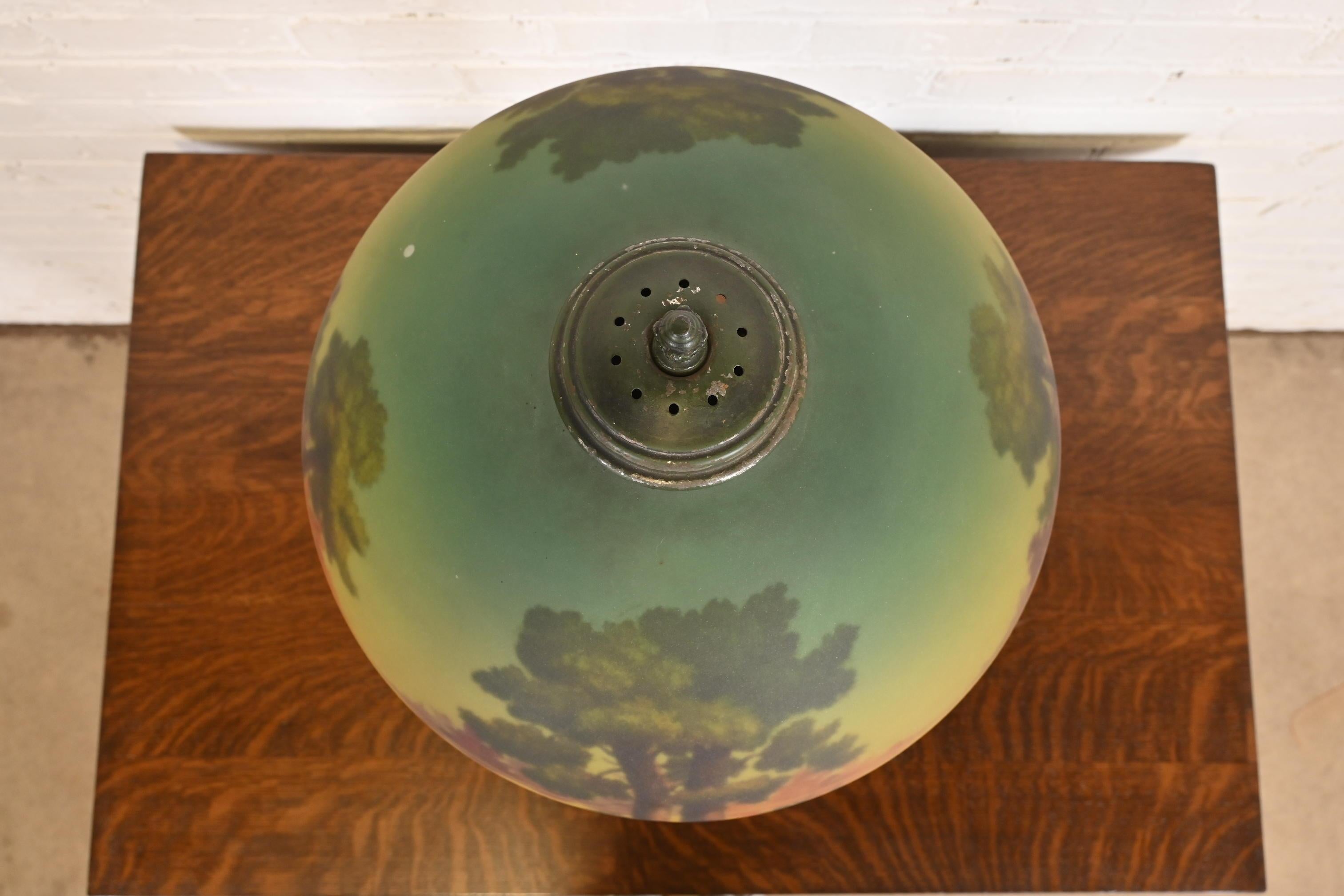 Metal Antique Arts & Crafts Table Lamp With Reverse Painted Lake Scene, Circa 1920s For Sale