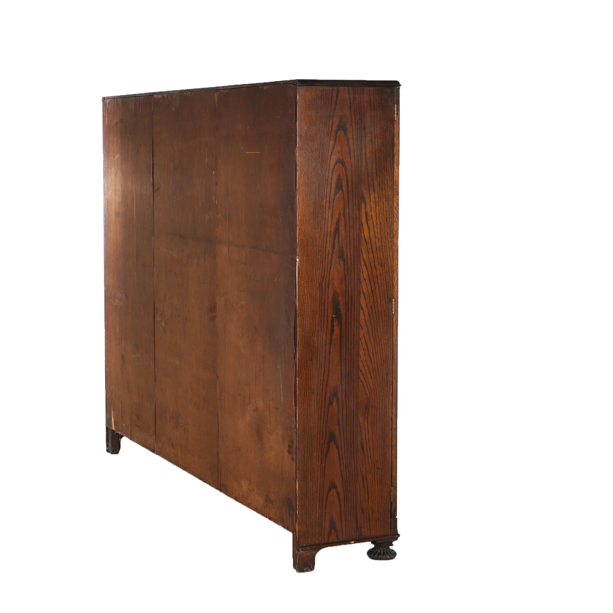 Antique Arts & Crafts Three-Door Enclosed Oak Bookcase with Carved Feet C1910 9