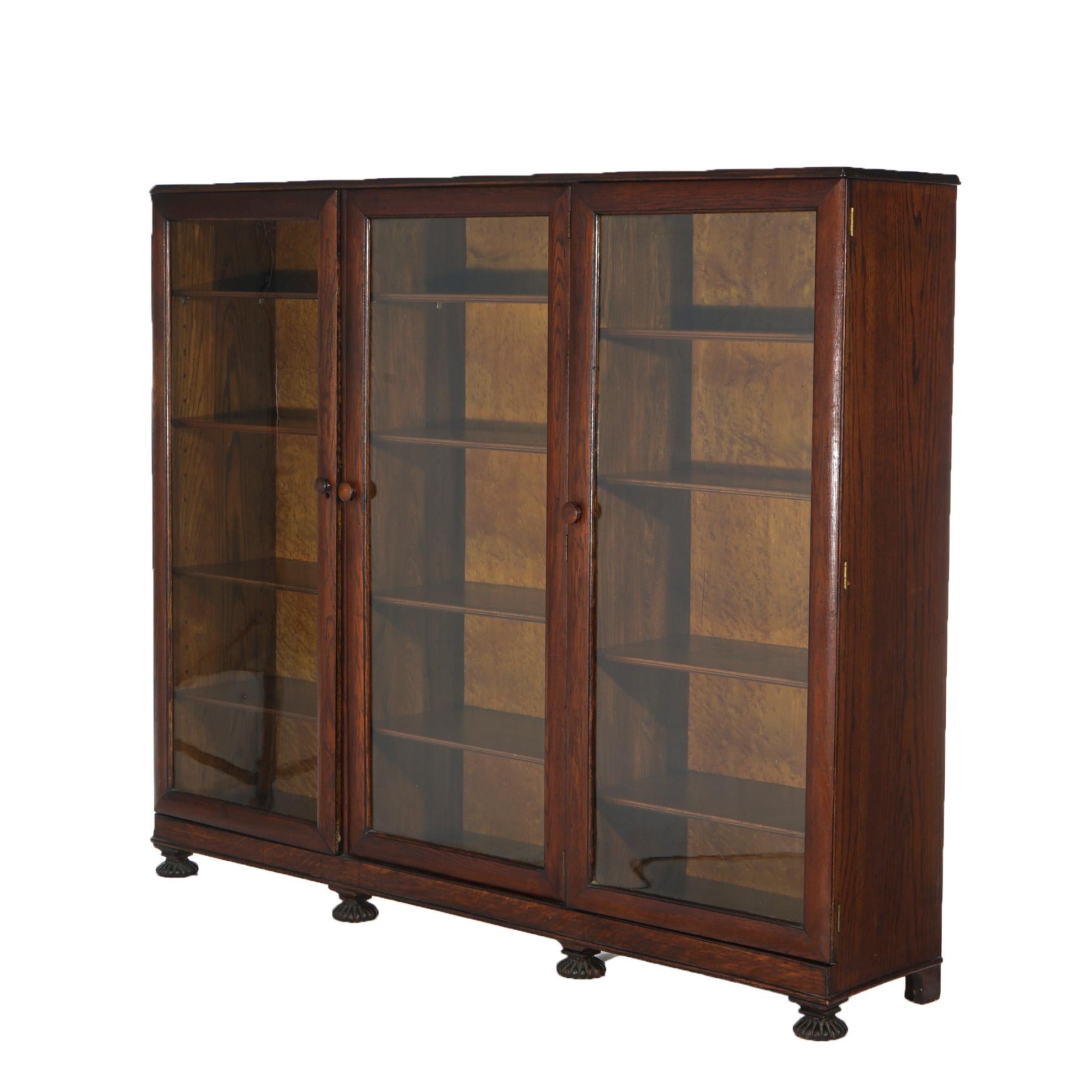 20th Century Antique Arts & Crafts Three-Door Enclosed Oak Bookcase with Carved Feet C1910