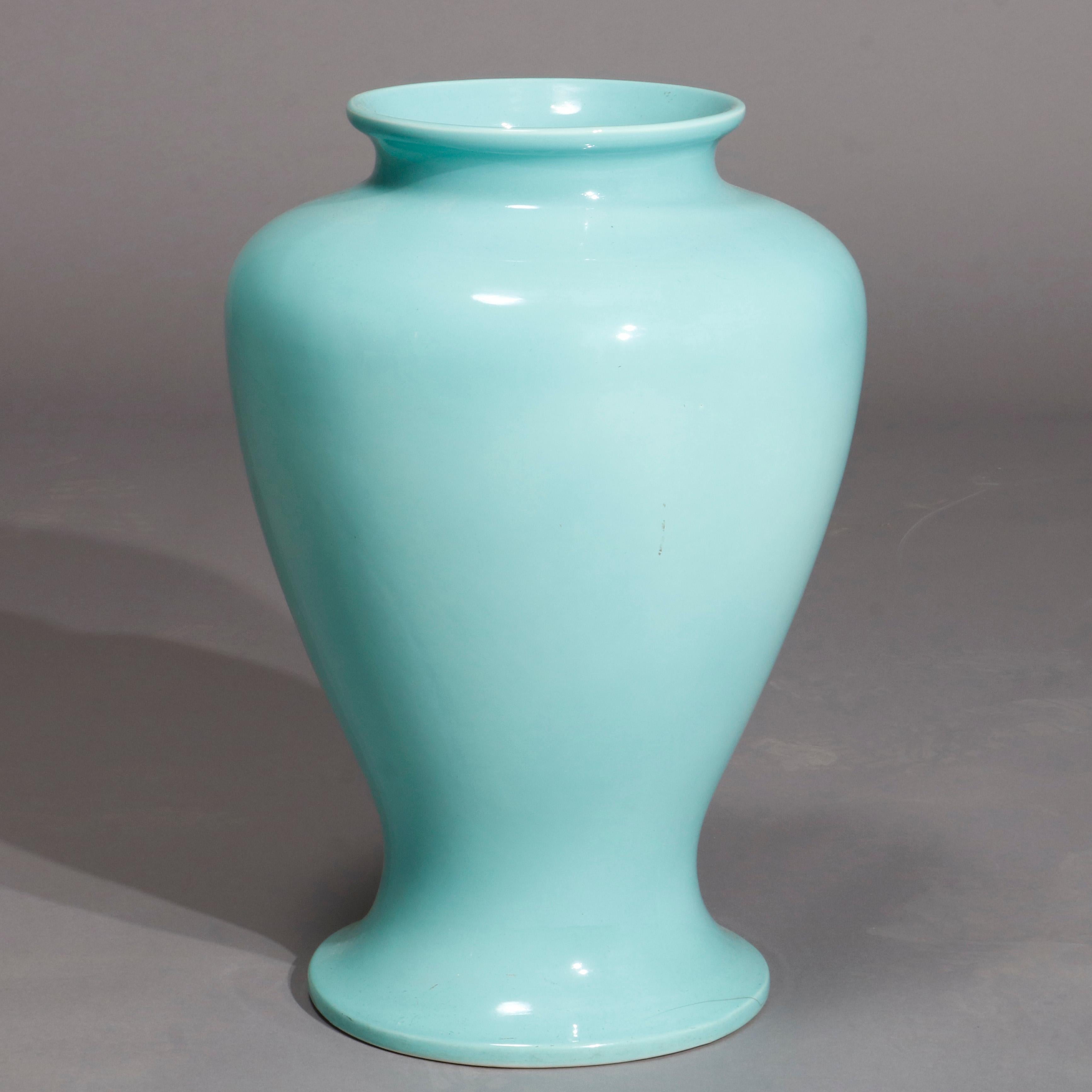An antique Arts & Crafts Trenton ware art pottery floor vase offers blue glazed urn form vessel with maker stamp on base as photographed, 20th century

Measures- 23