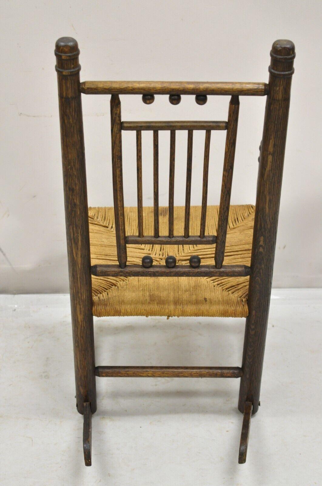 Antique Arts & Crafts Victorian Oak Wood Rush Seat Small Child's Rocking Chair For Sale 1