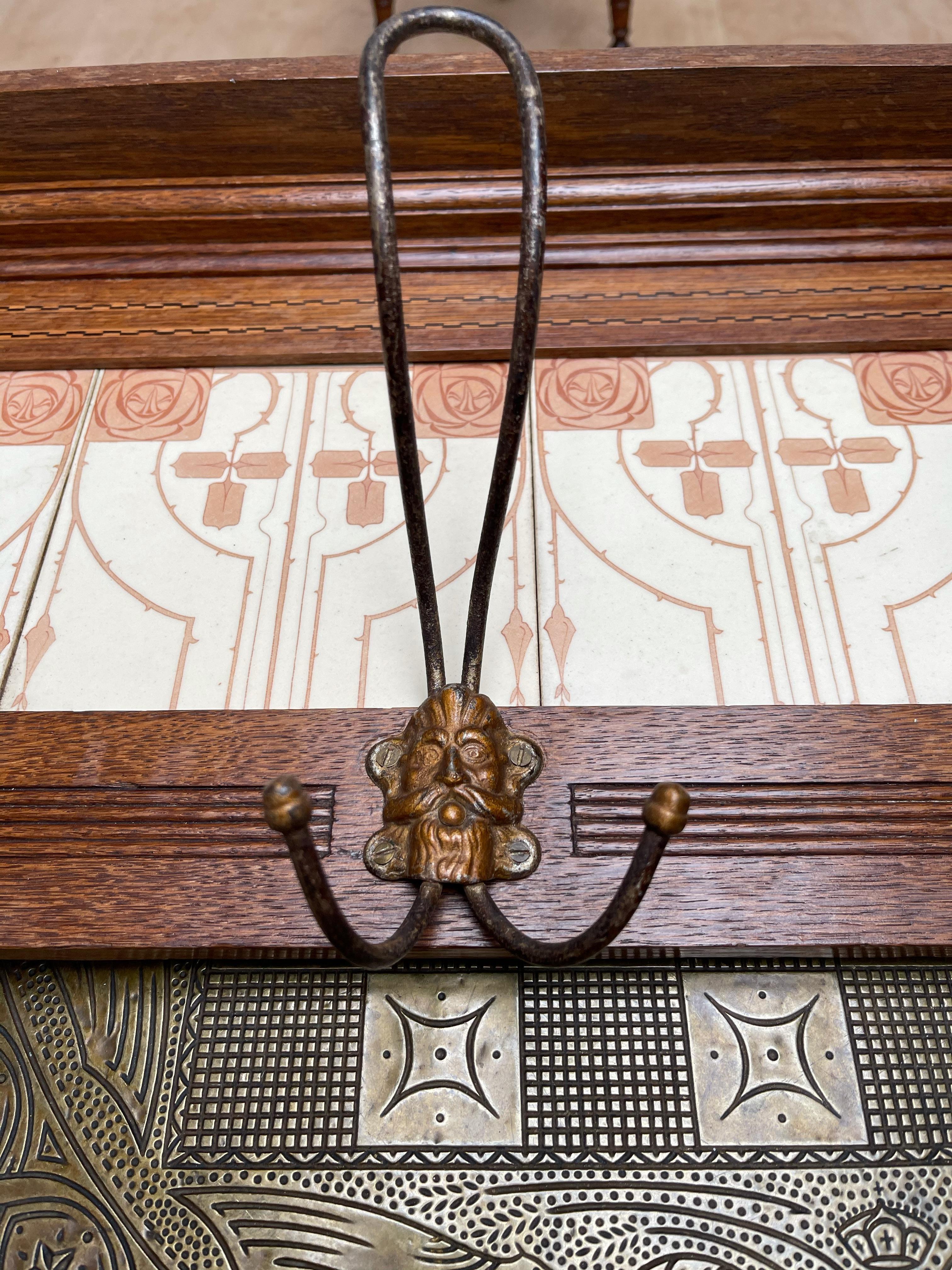European Arts & Crafts Wall Coat Rack with Unique Stylized Flower Tiles, circa 1900